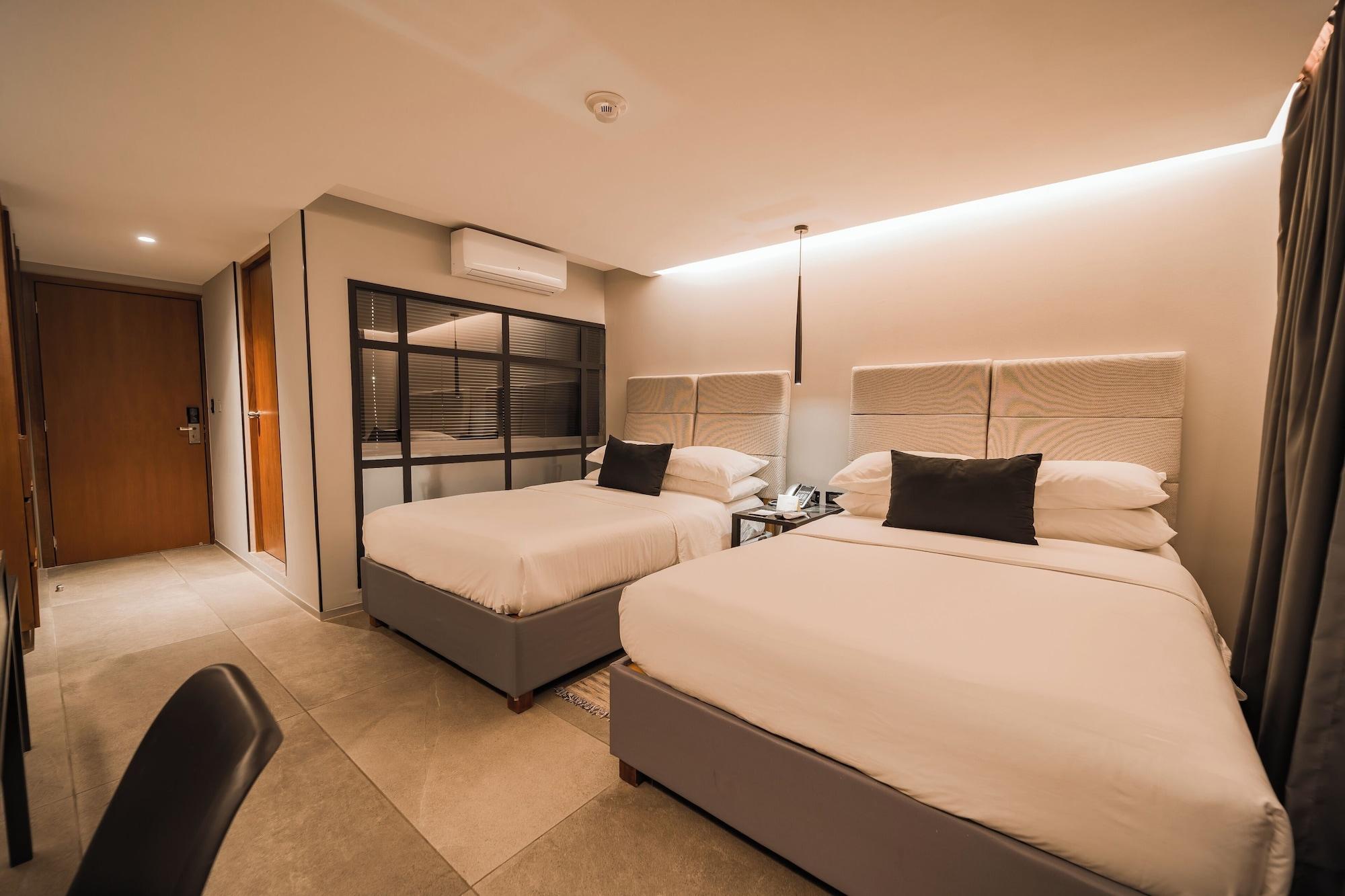 Habitación Óntico Urban Design Hotel