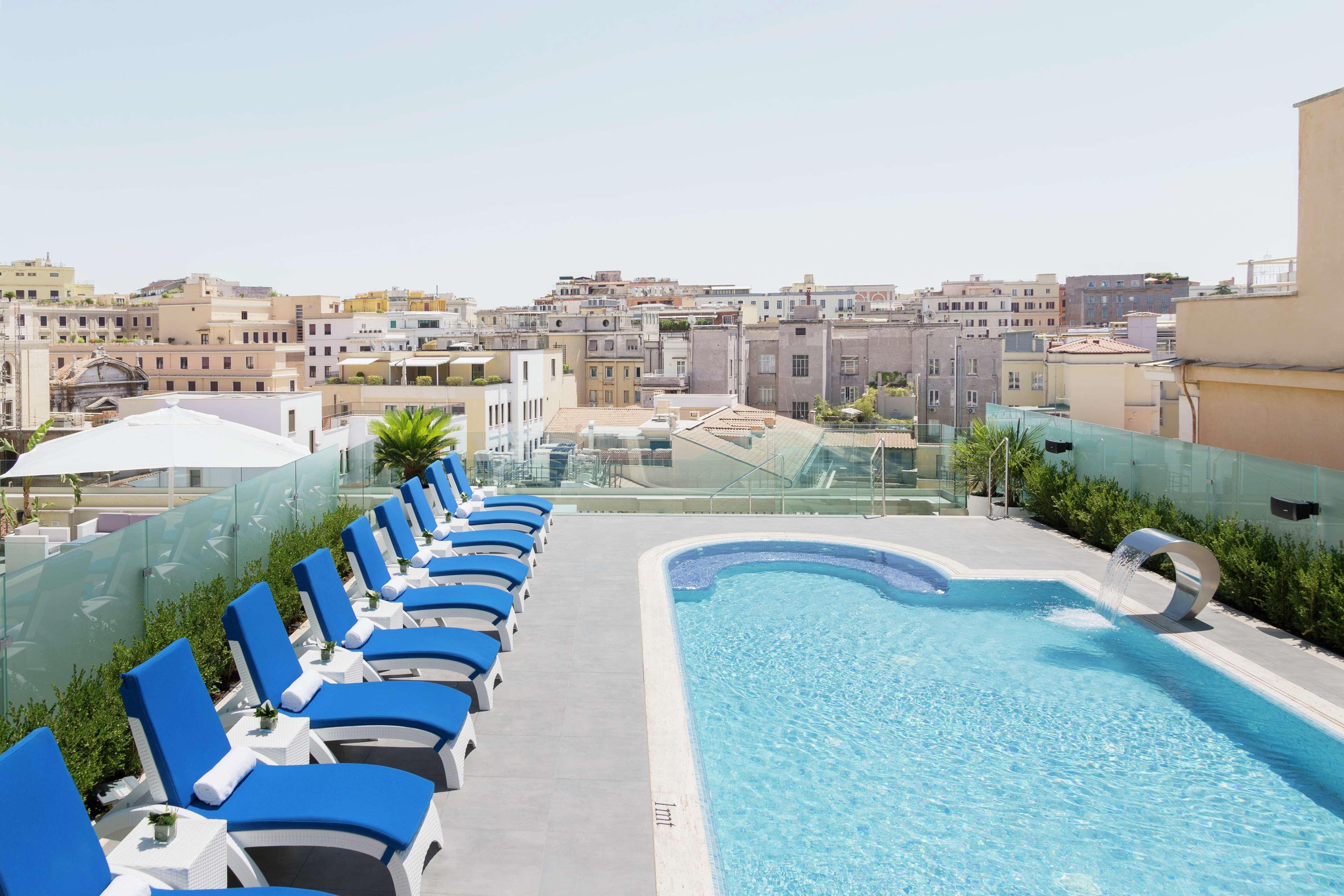 Vista Piscina Aleph Rome Hotel Curio Collection by Hilton