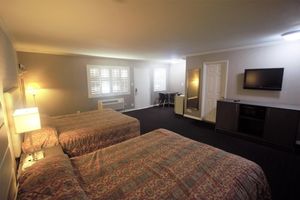 Alojamiento - Alpha Inn & Suites