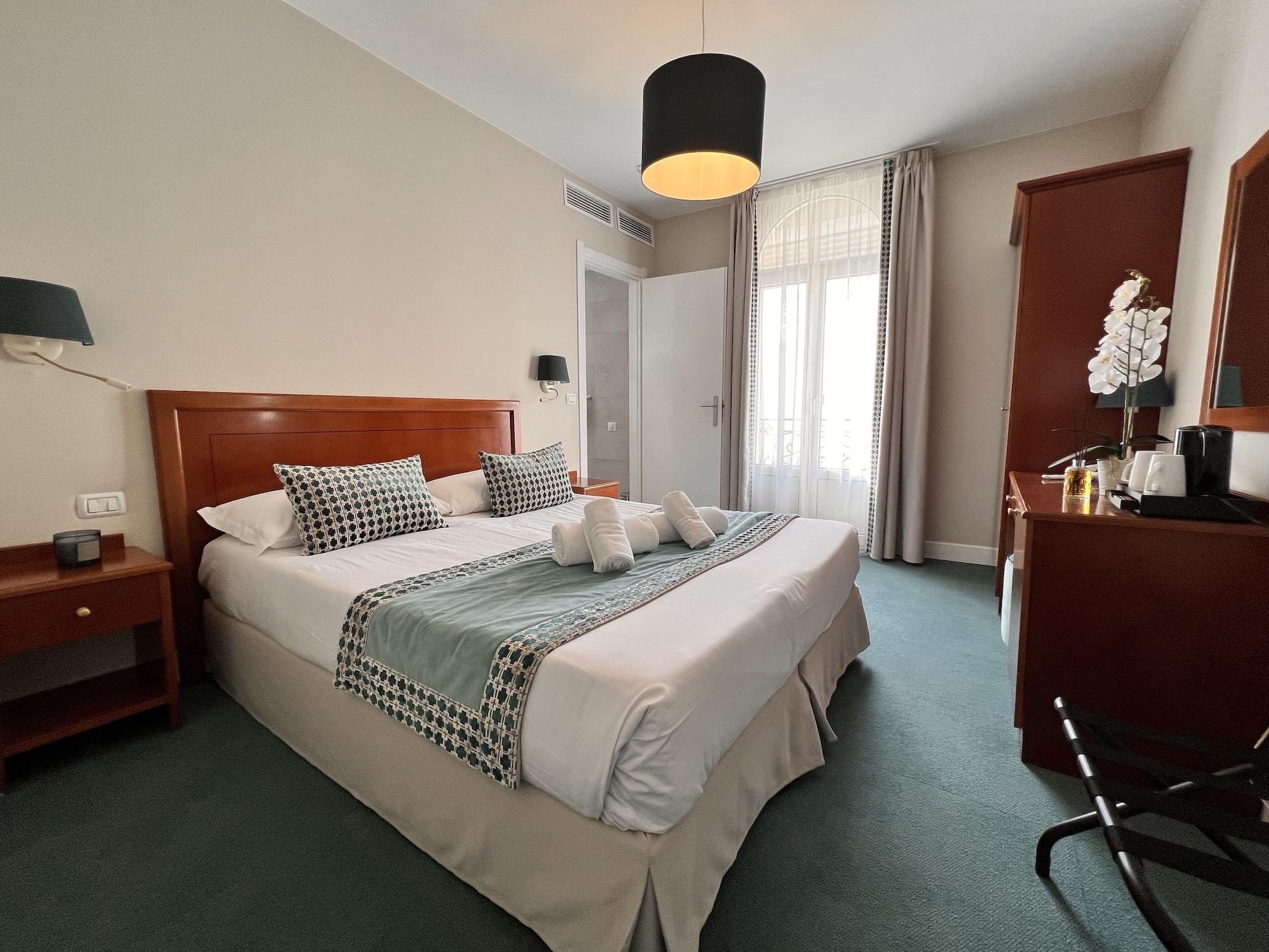 Habitación Hotel Olympia
