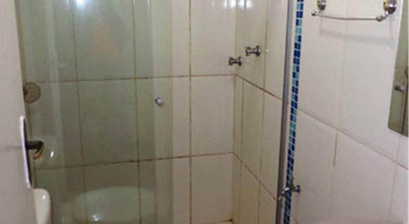 Comodidades do quarto Pousada das Palmeiras
