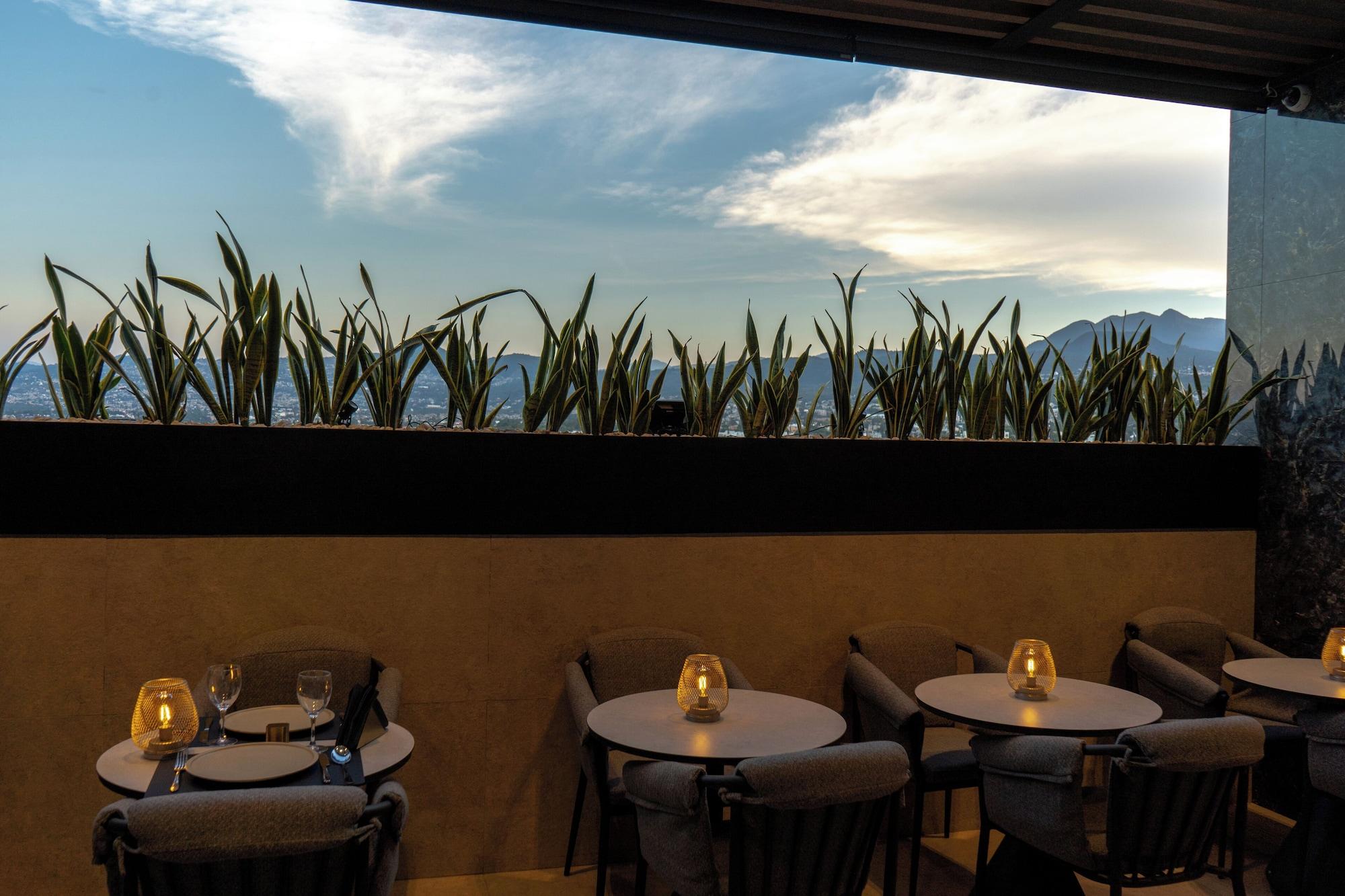 Restaurant Punto Suites Periférico Sur