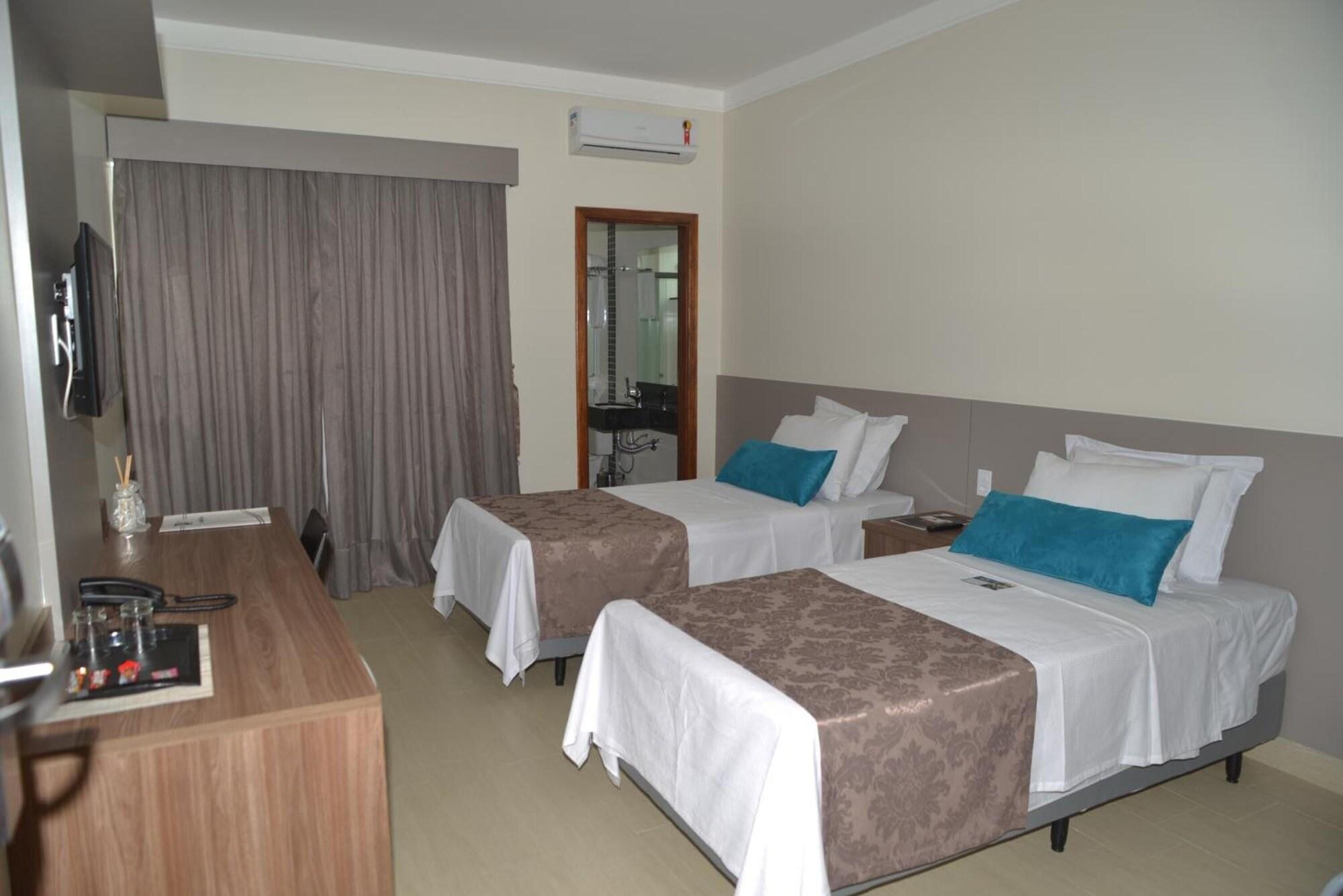 Habitación Racini Suites Hotel