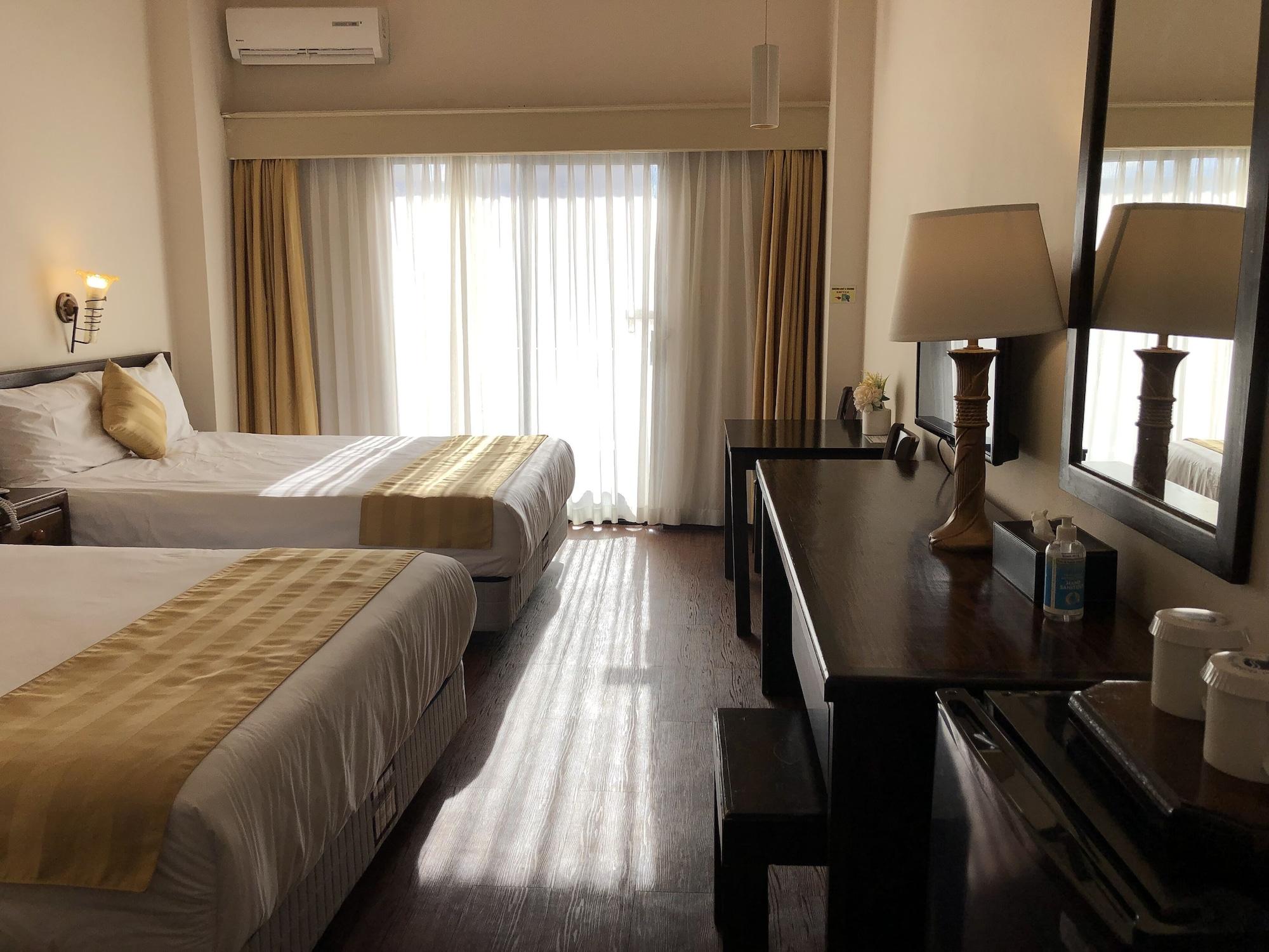 Habitación Holiday Saipan Hotel