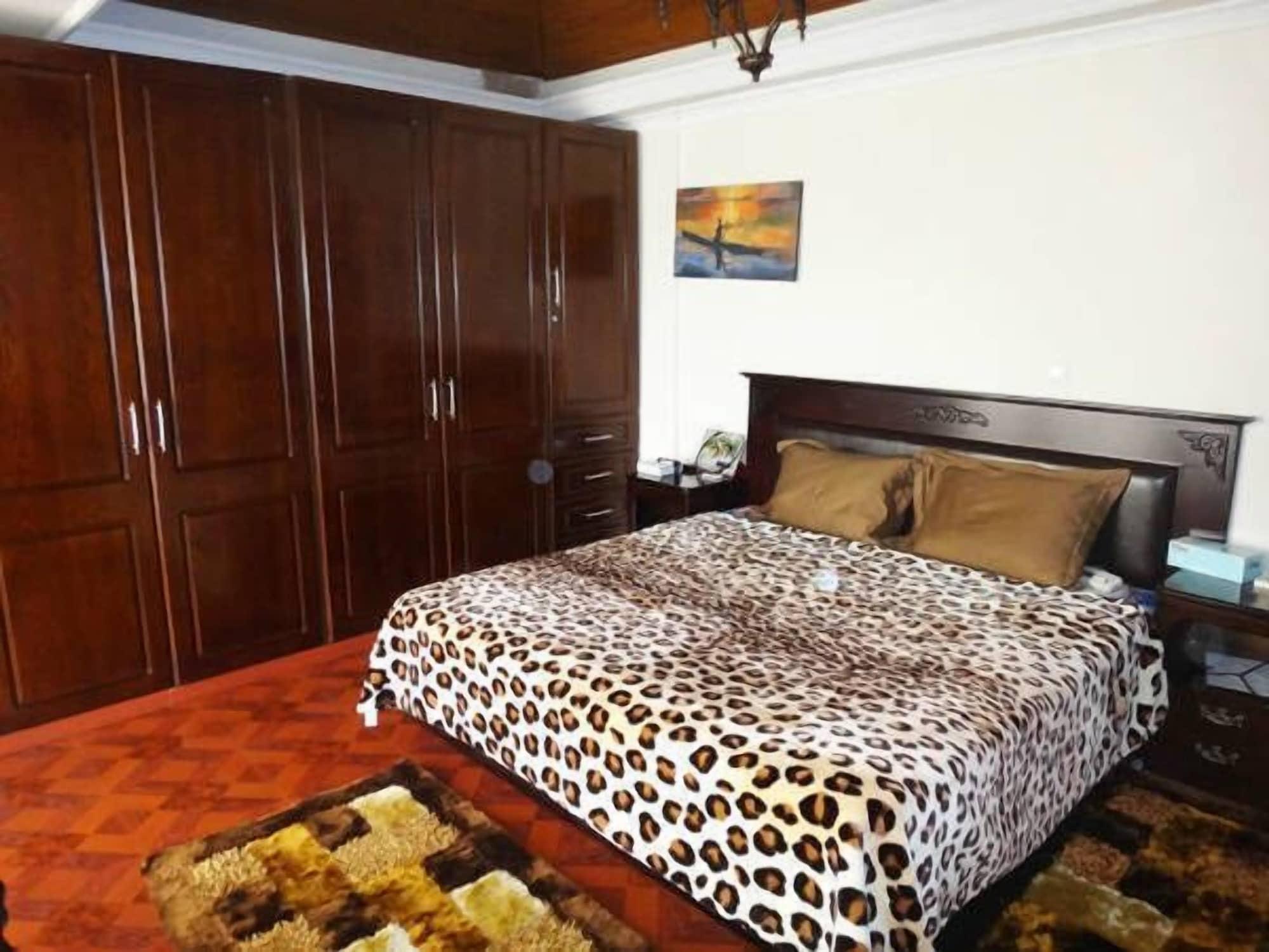 Habitación Millennium Apartment Hotel