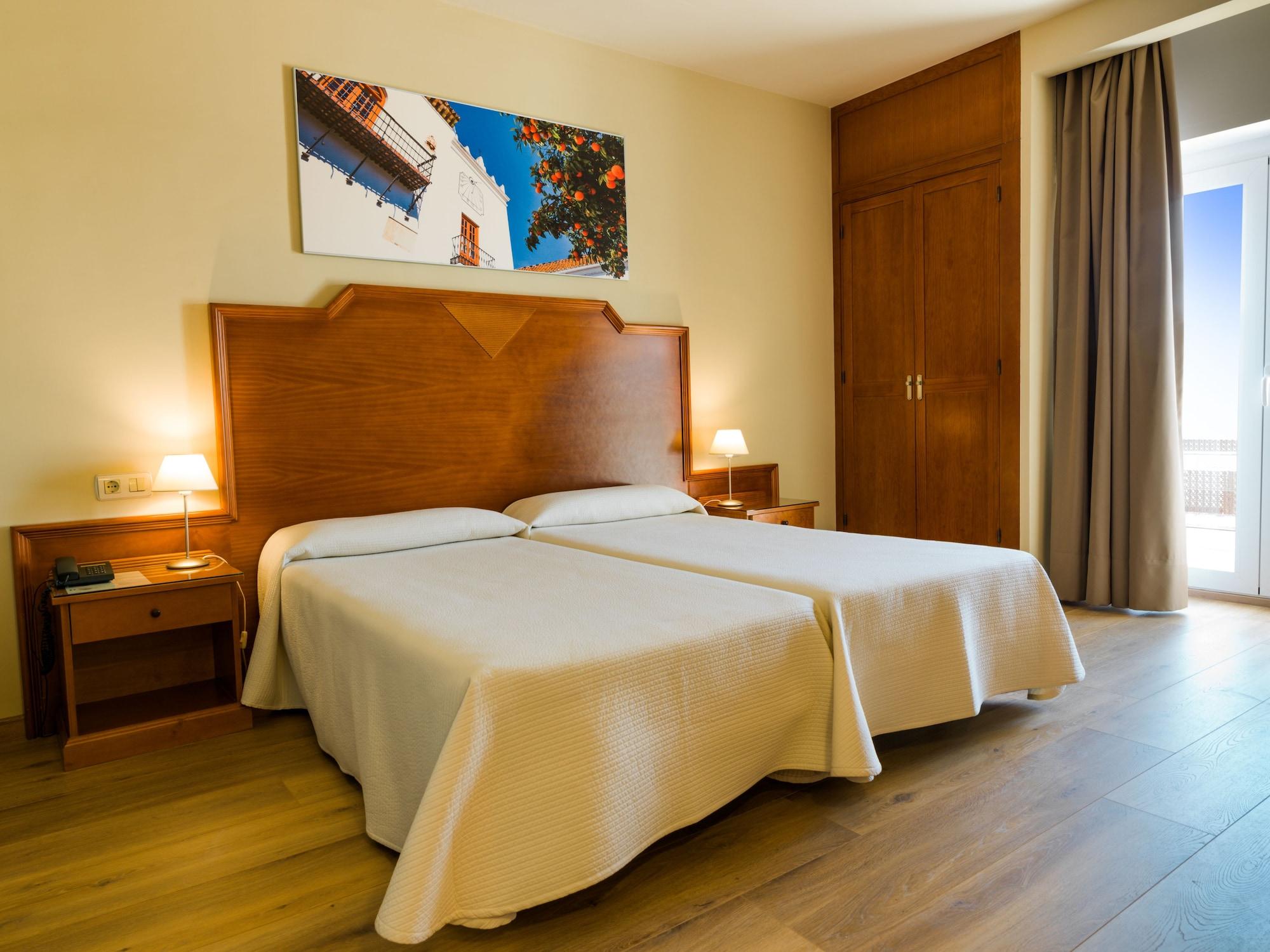 Habitación Hotel Monarque El Rodeo