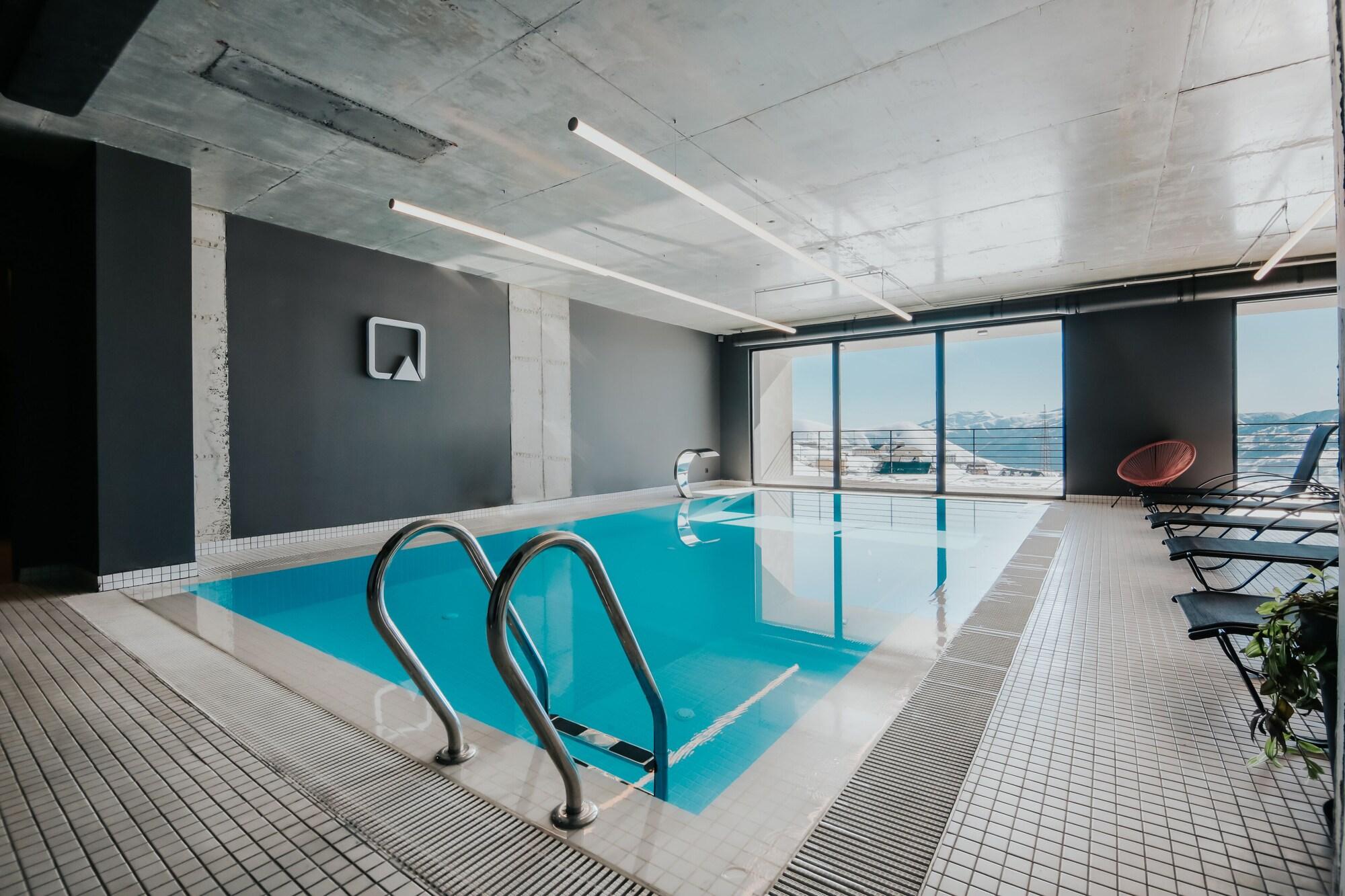 Vista Piscina Quadrum Ski & Yoga Resort