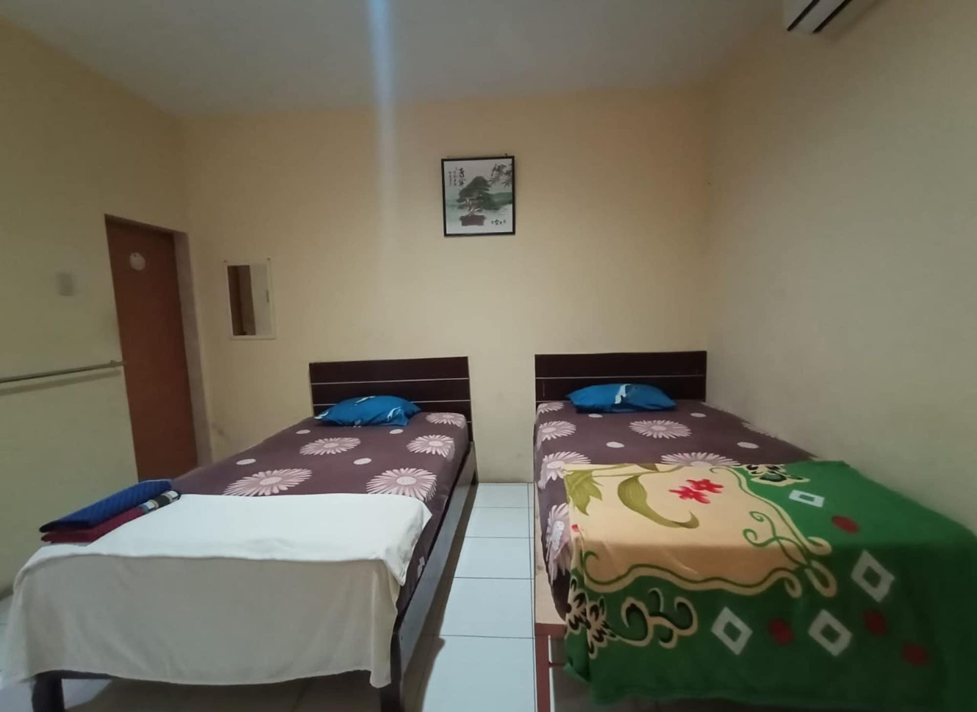 Habitación First Inn Hotel