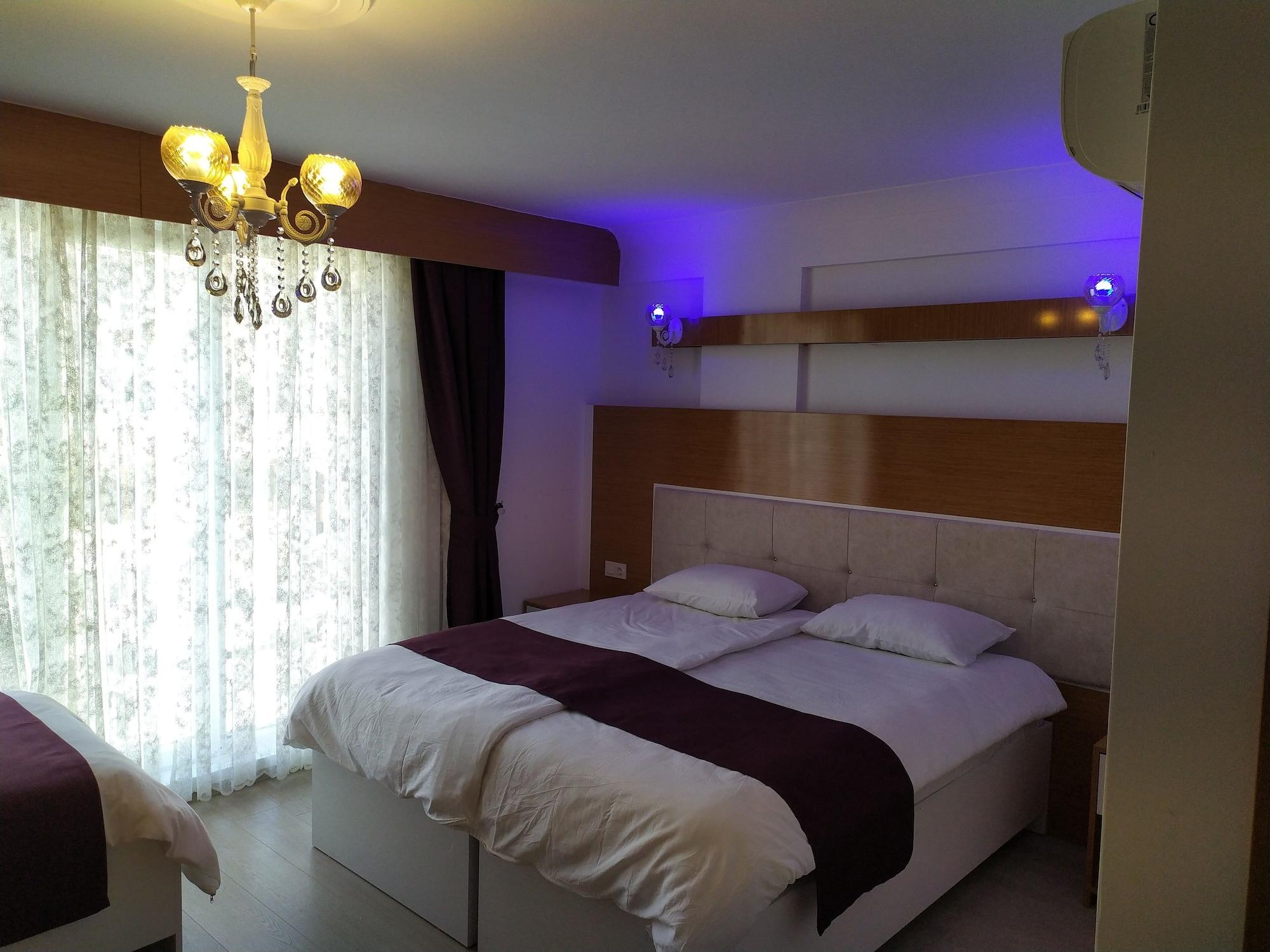 Quarto Kuyas Apart Hotel