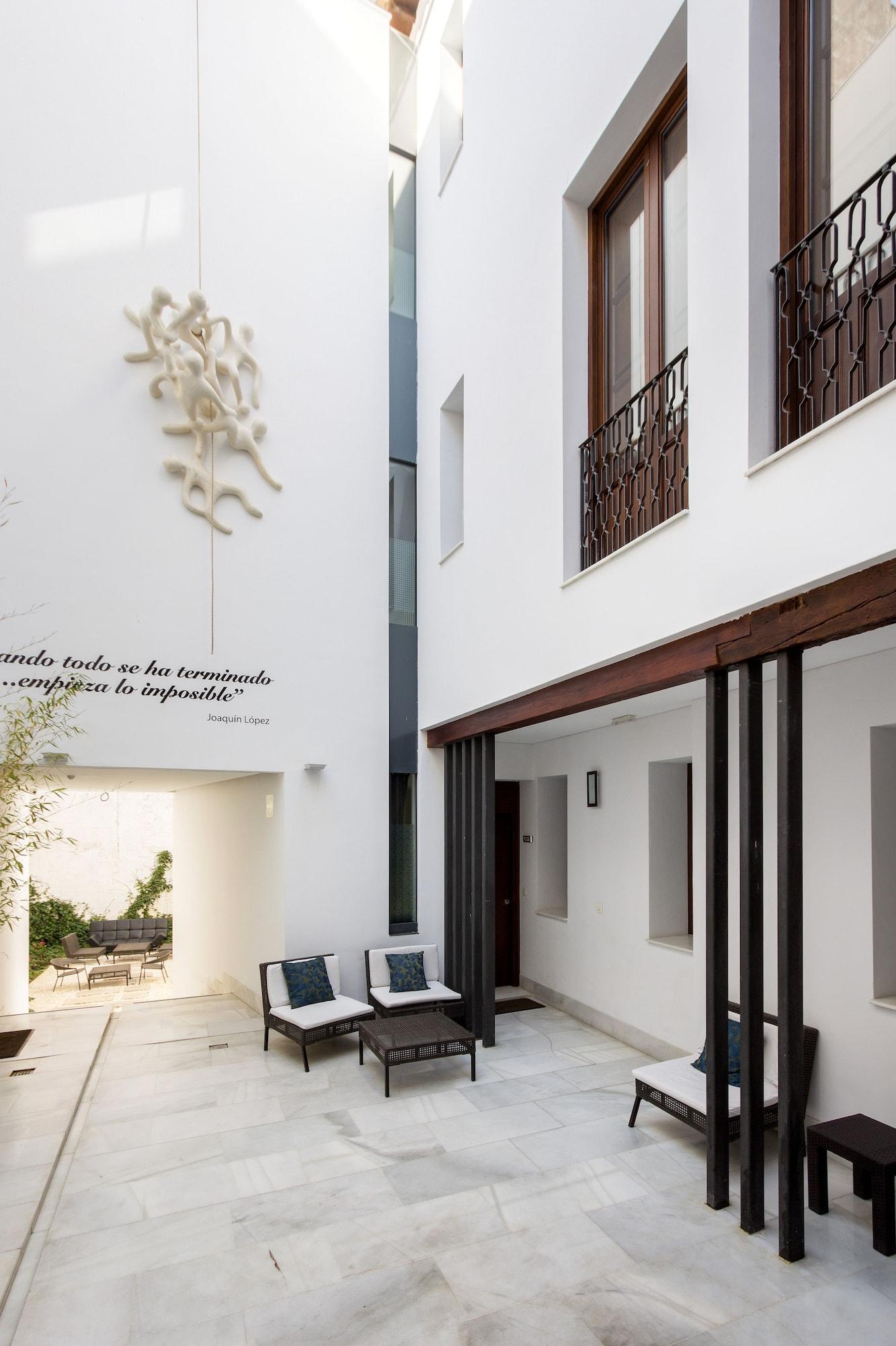 Vista Lobby Elvira Suites Apartamentos