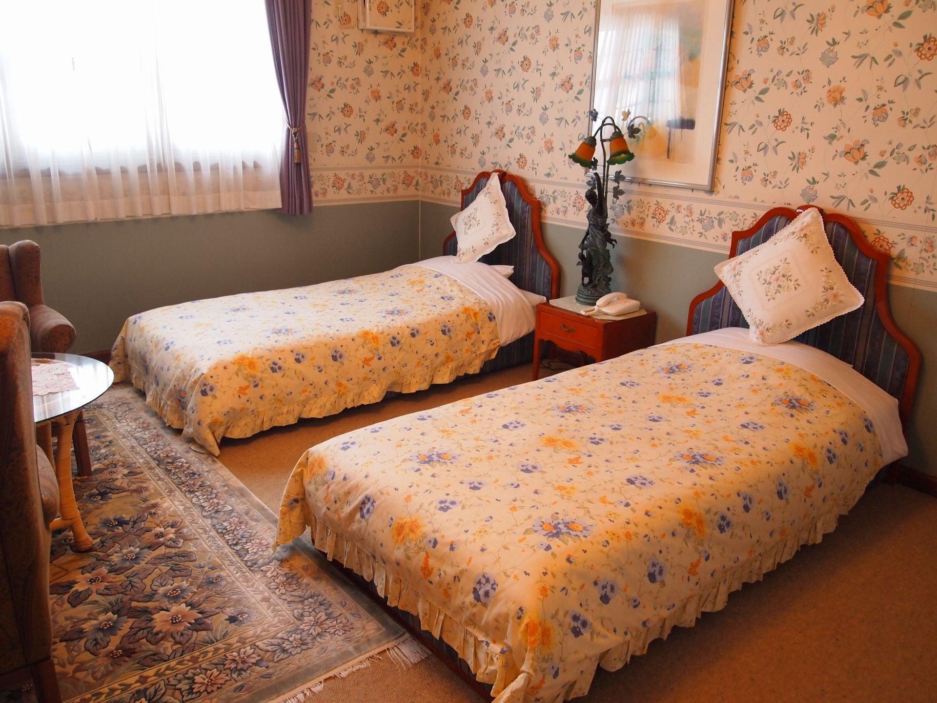 Habitación Petit Hotel Corinthian