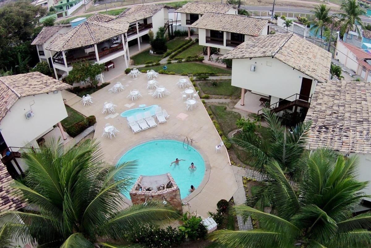 Vista da piscina Pousada Aldeia Mar
