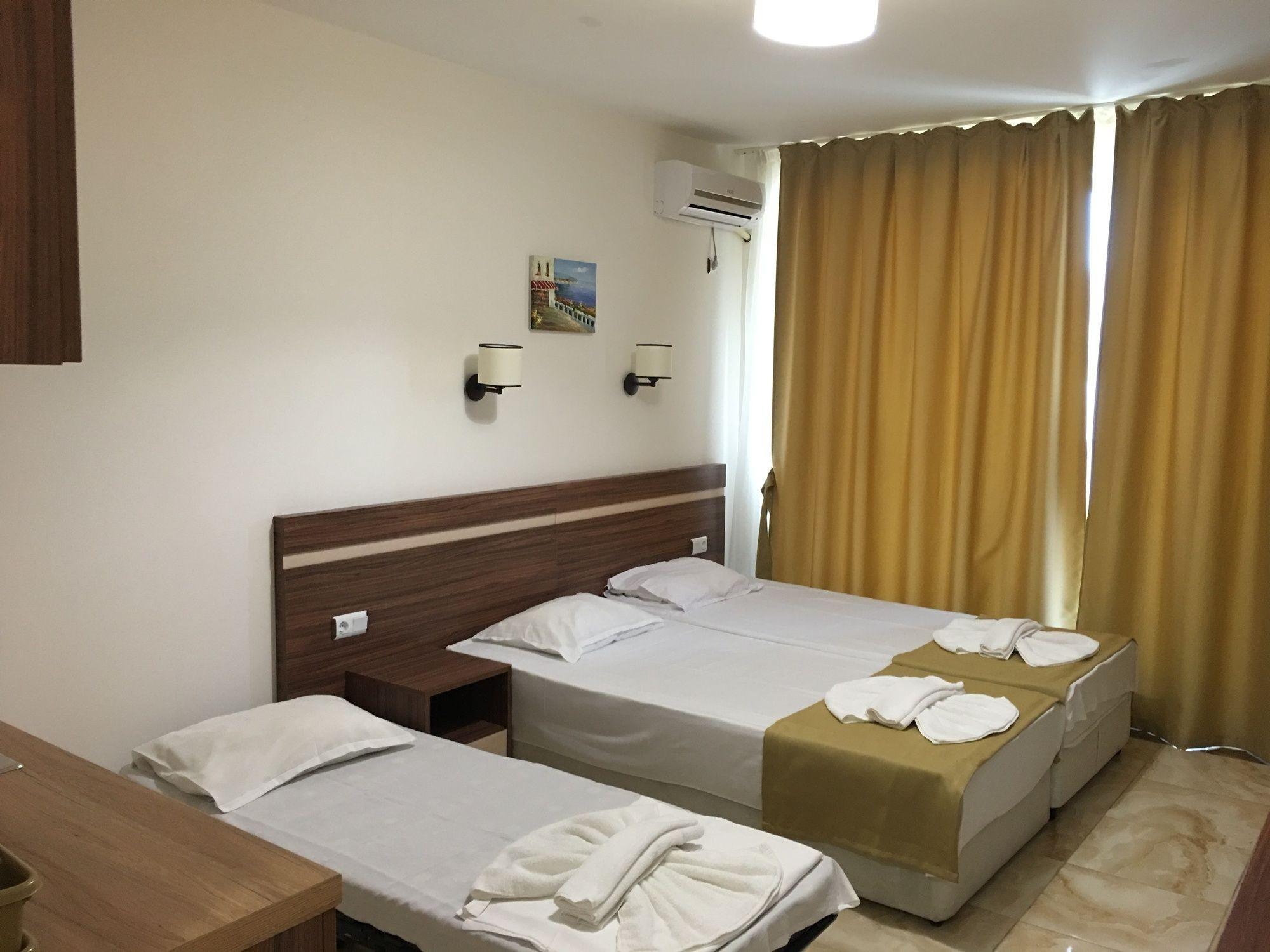 Habitación Palm Residence Deluxe Studios