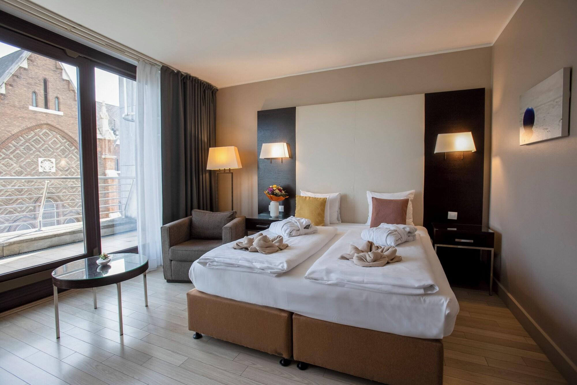 Habitación Lions Garden Hotel