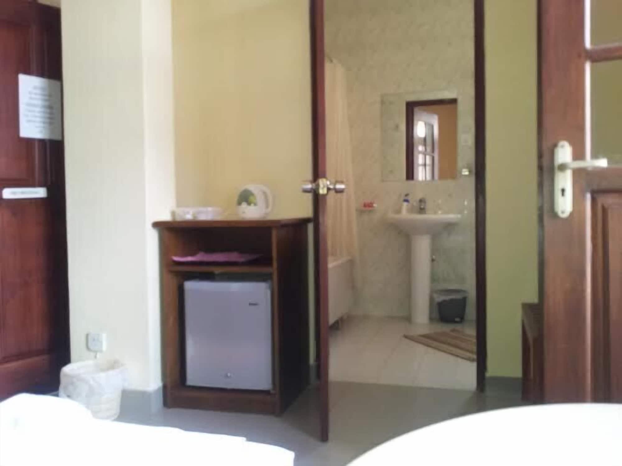 Set de Habitación Janishi Residencies