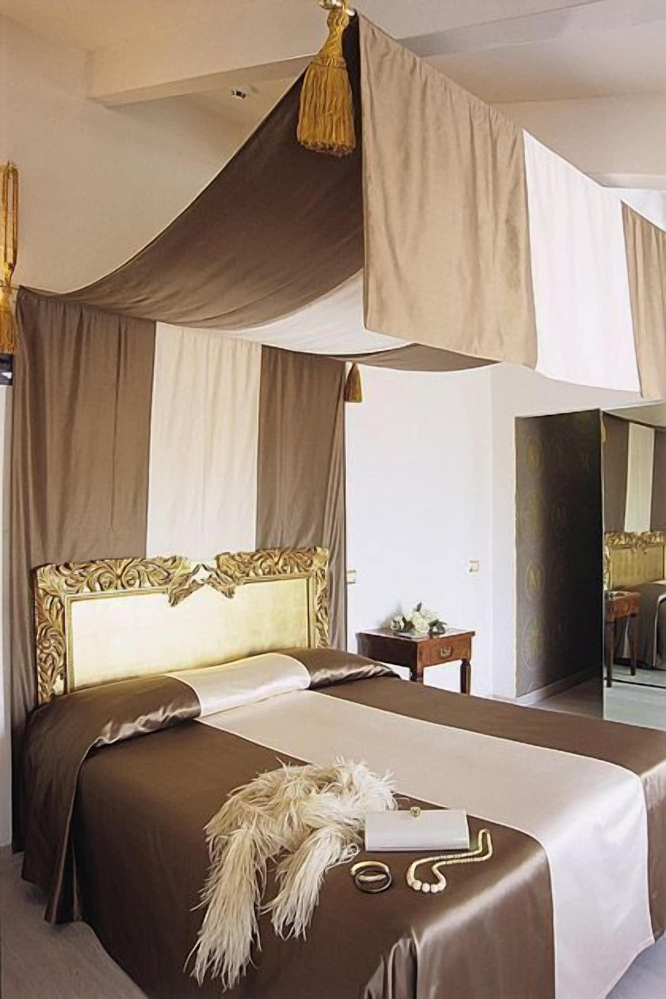 Habitación M Glamour Hotel