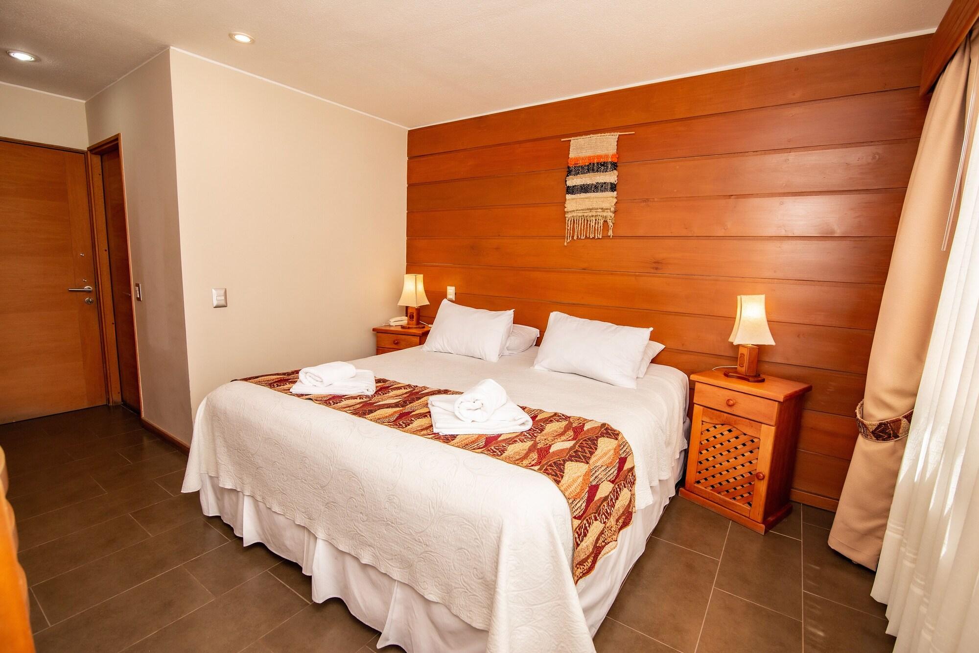 Quarto Hotel Vientos del Sur