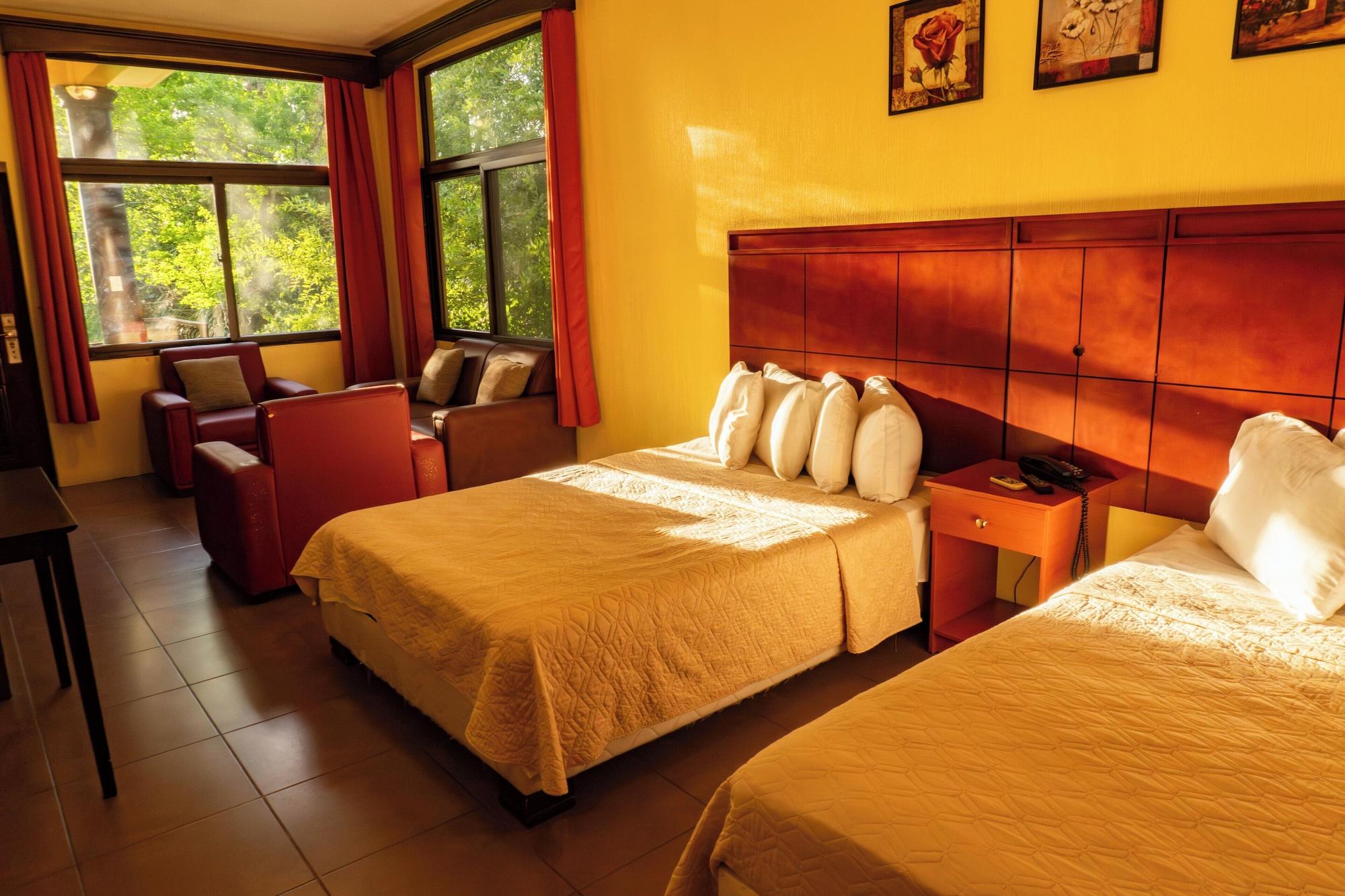 Habitación Grand Caporal Hotel