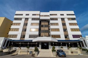 Alojamiento - Hotel Axis Inn By GEH Suites