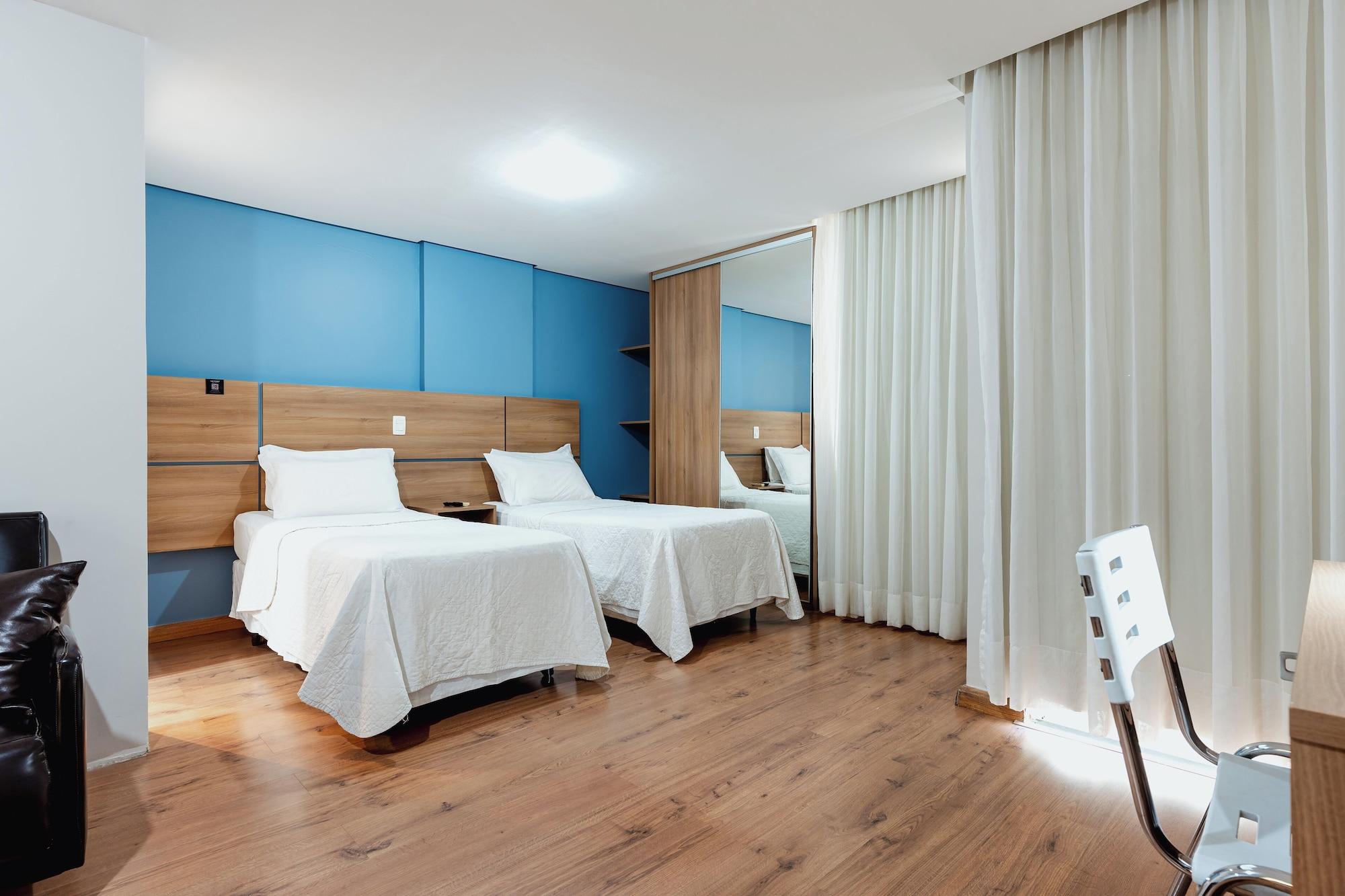 Habitación Victory Suites Hotel