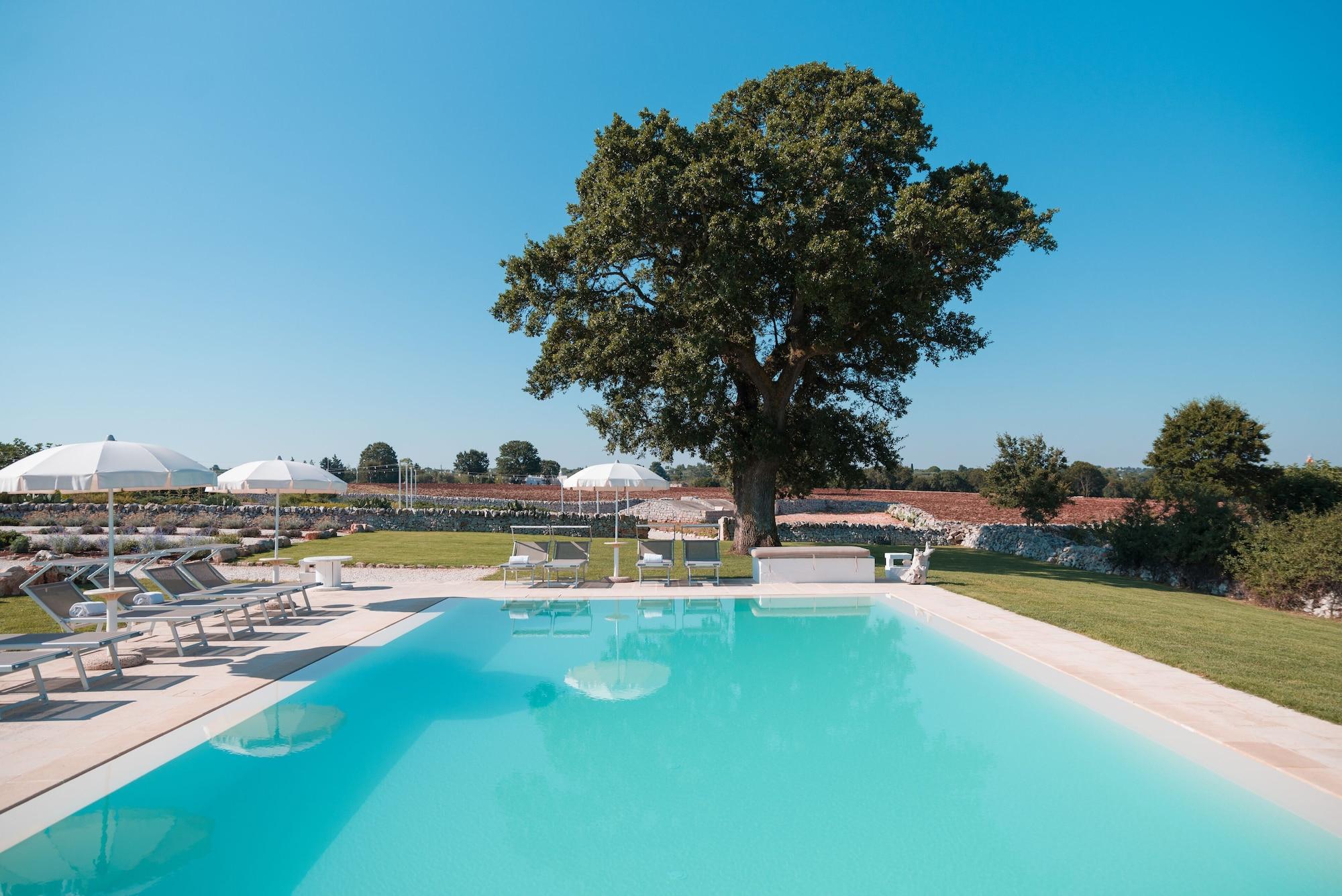 Vista Piscina Nina Trulli Resort