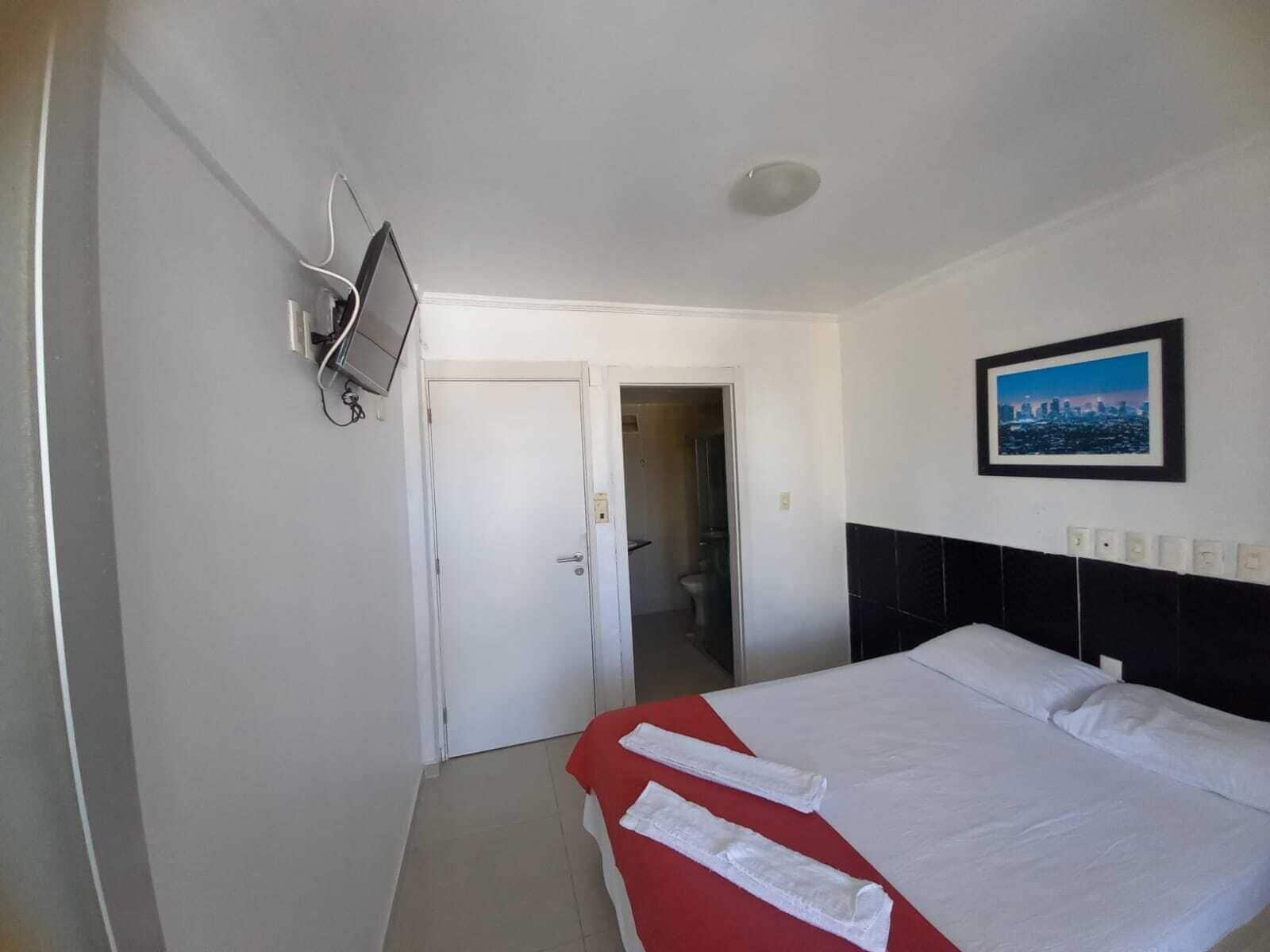 Quarto Escuna Hotel Pousada