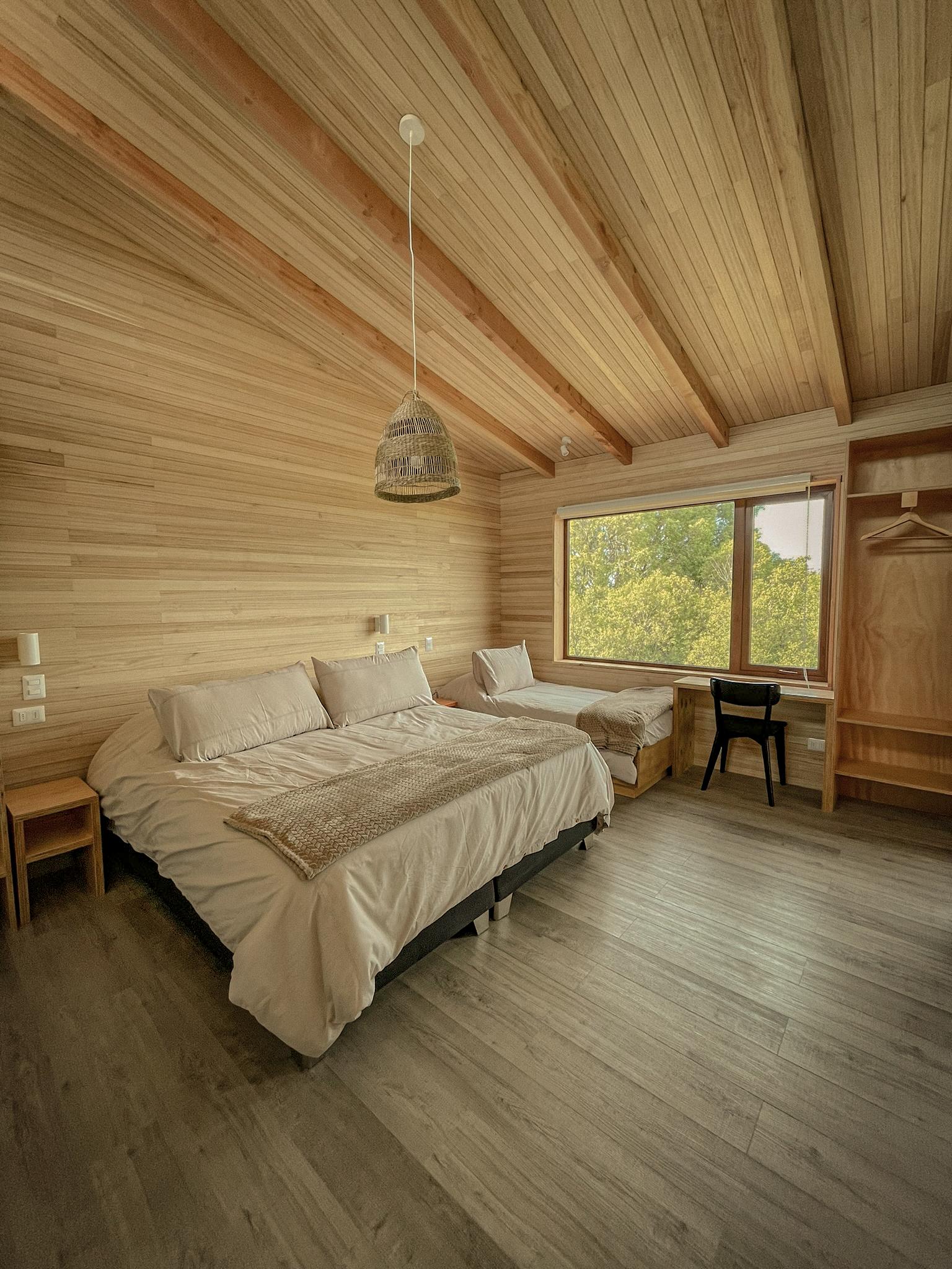Habitación Ave Lodge Frutillar