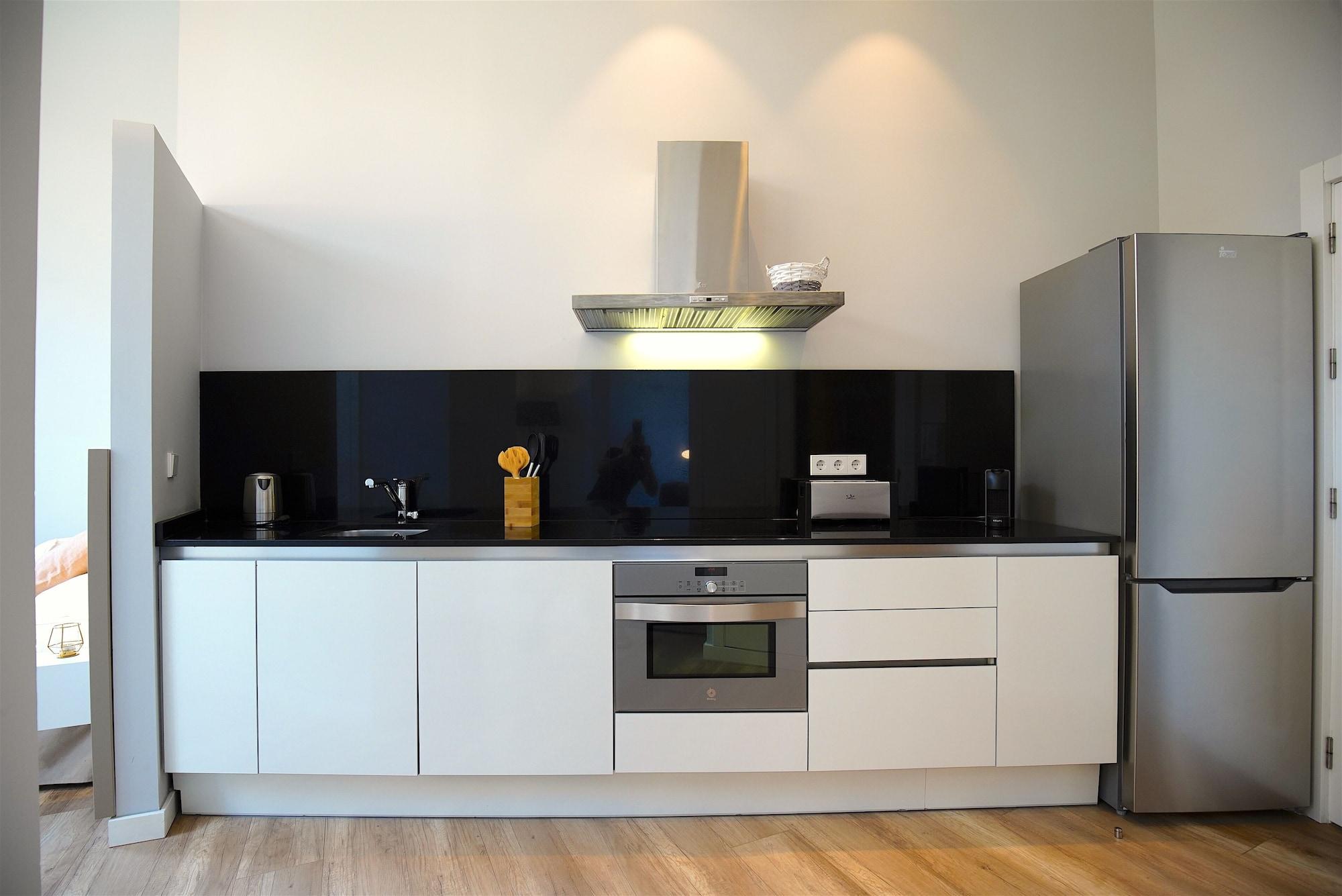 Equipamiento de Habitación L'Aguila Apartments Turismo de Interior