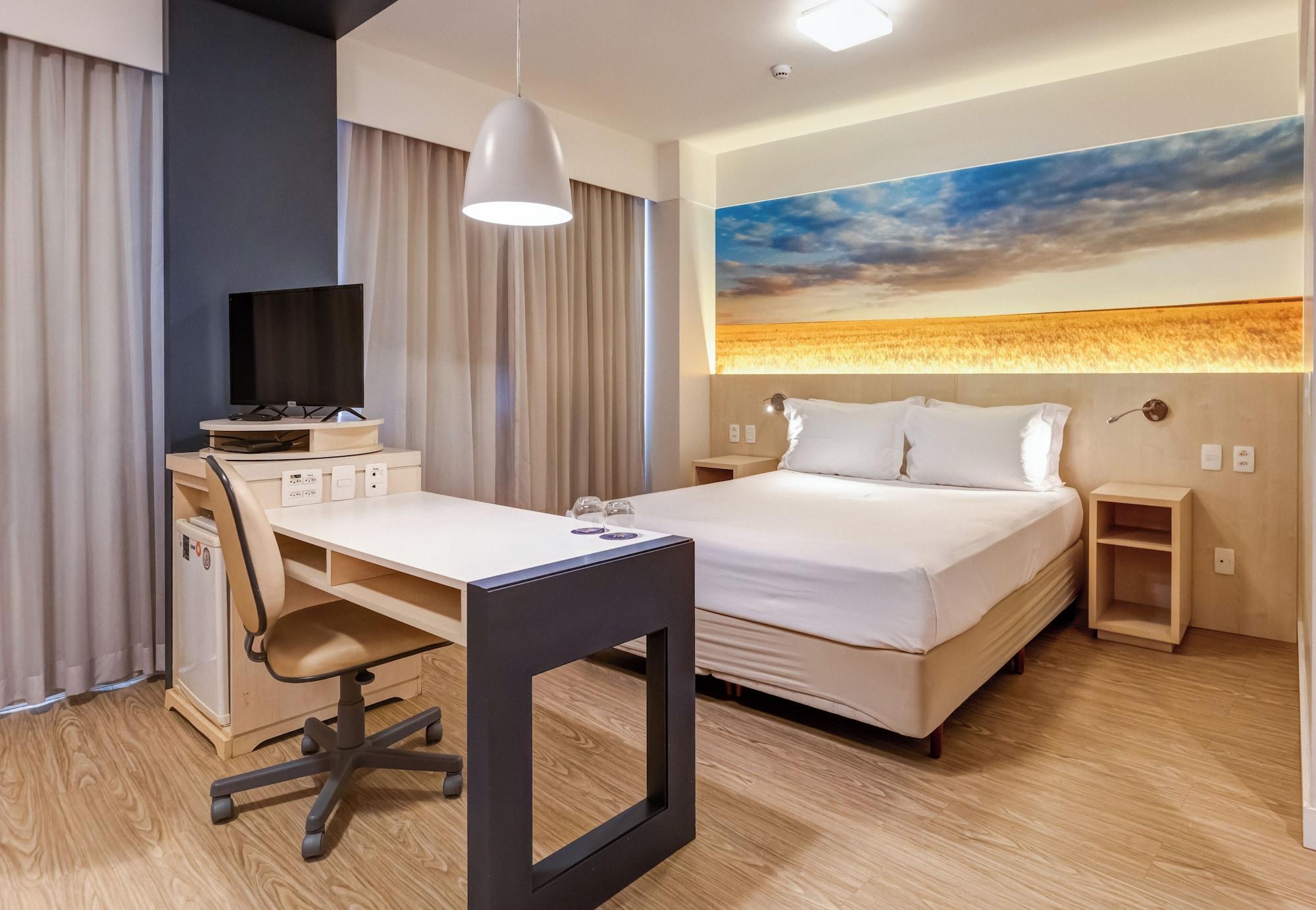 Habitación Comfort Suites Alphaville