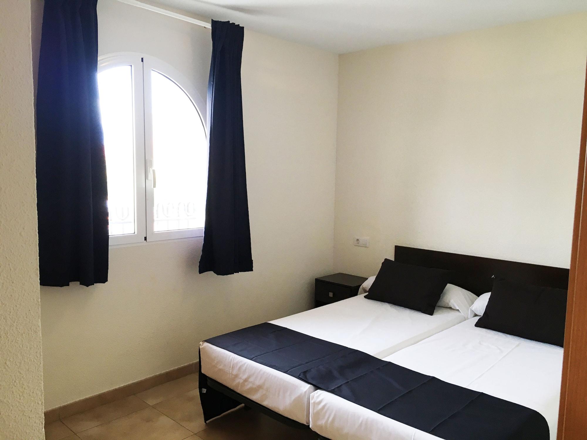 Habitación Apartamentos Doña Carmen 3000