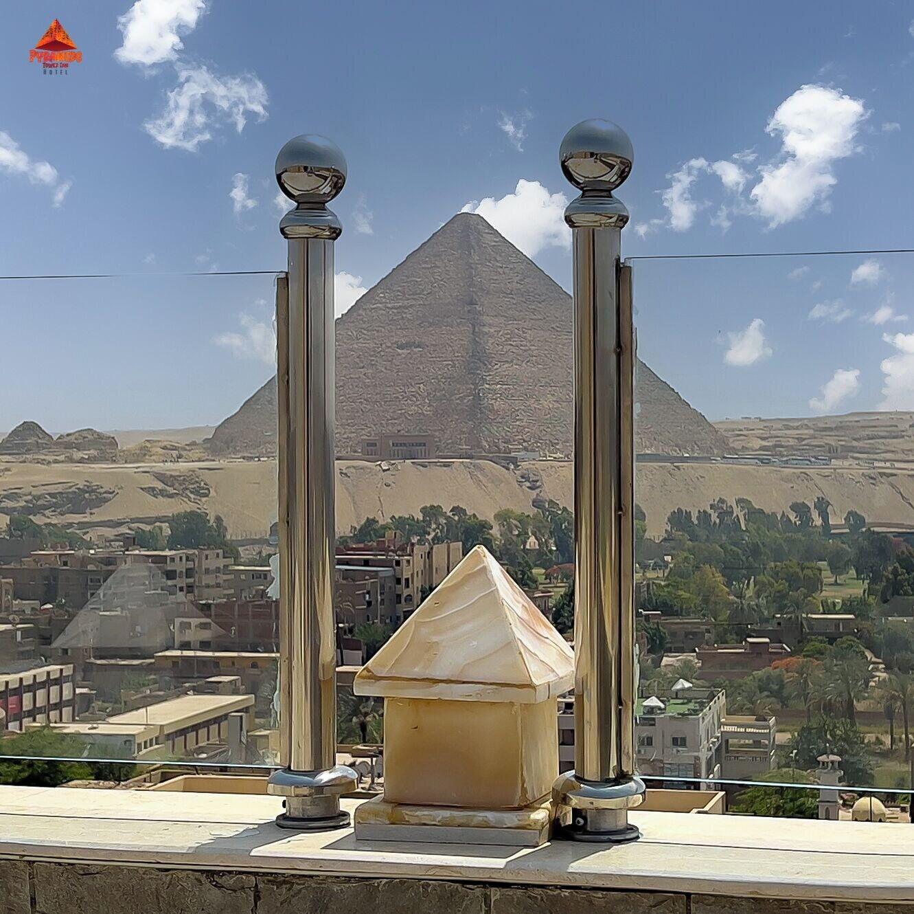 Varios pyramids tower view inn