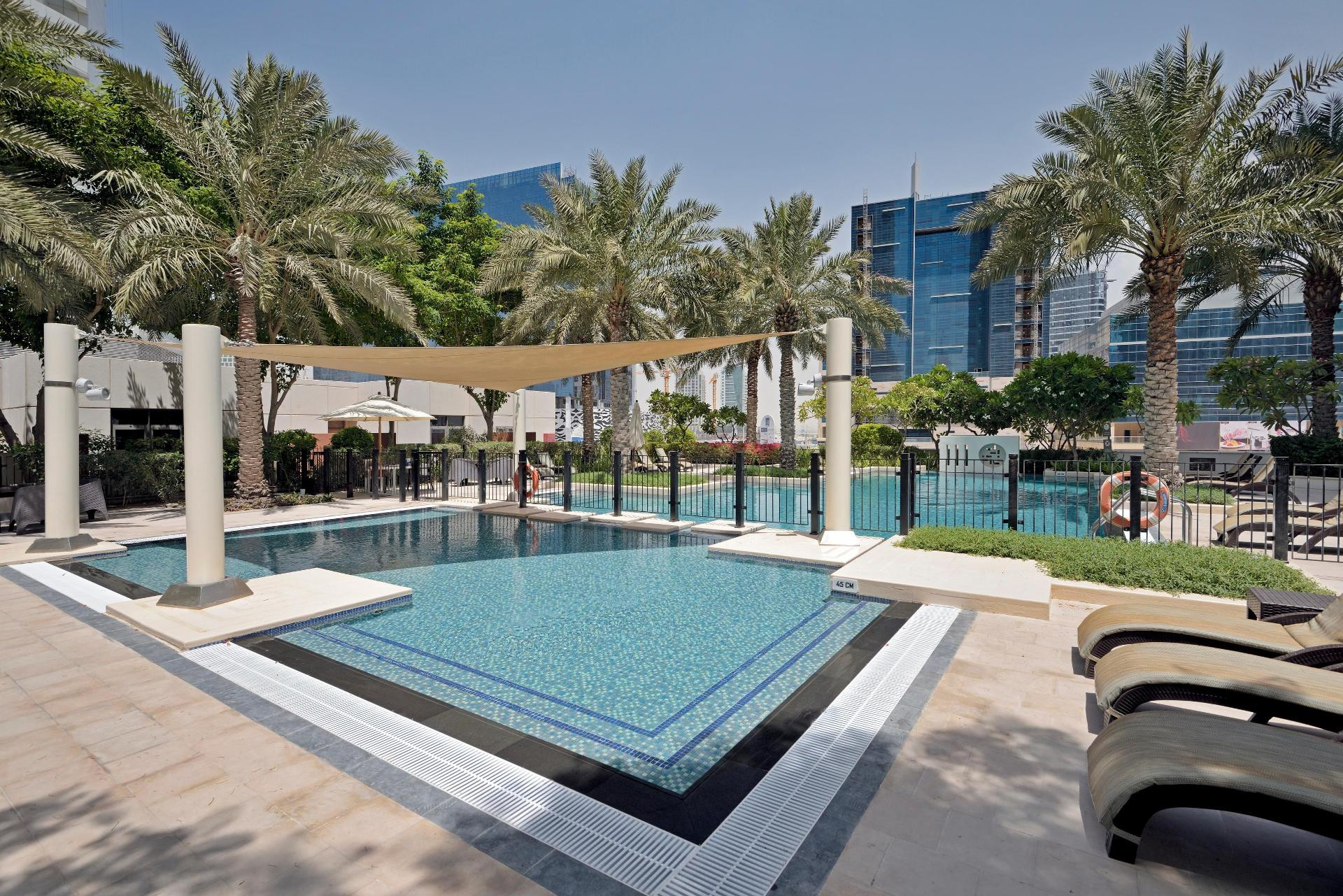 Vista da piscina Dream Inn Dubai Apartments-Southridge 4