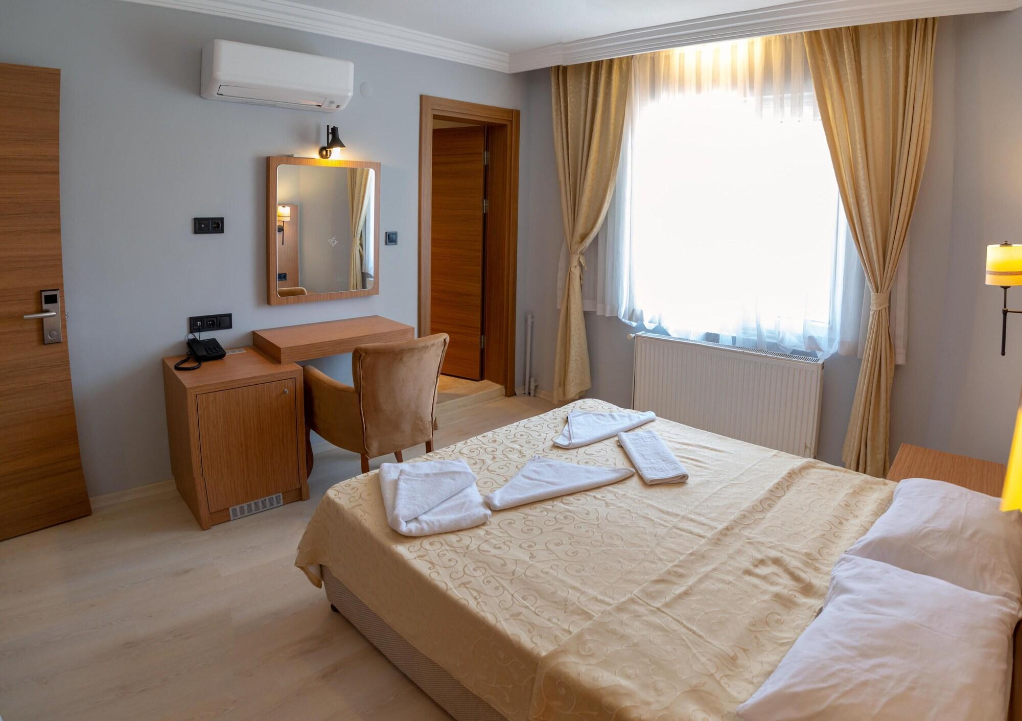Habitación A. Emreli Suite Hotel