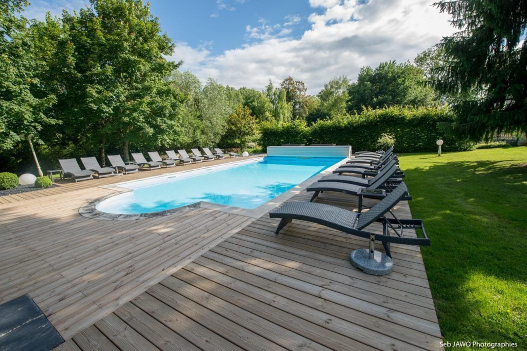 Vista Piscina Château du Clos de la Ribaudière