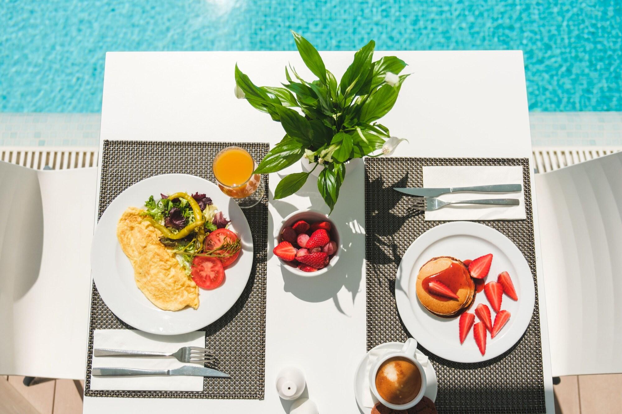 Restaurant Welikehotel Triton Beach