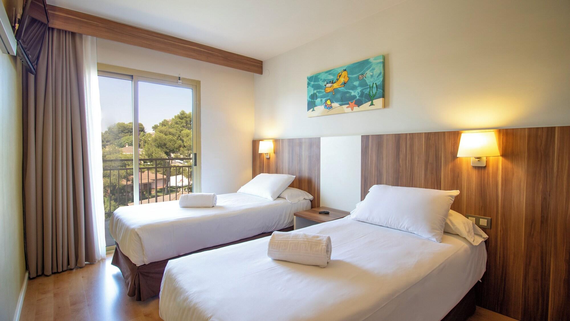 Habitación Golden Avenida Family Suites
