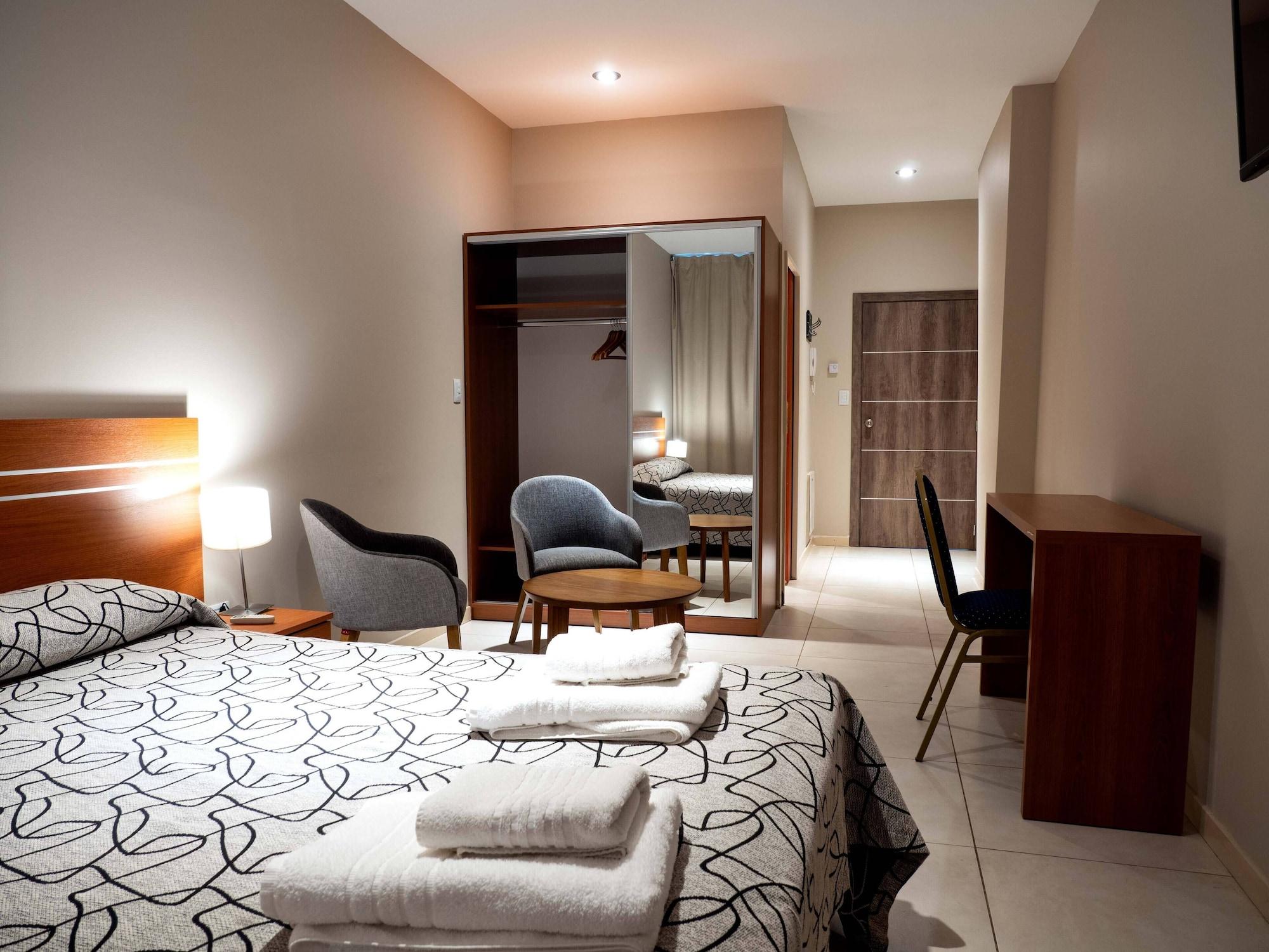 Habitación Leloir Suites & Meetings