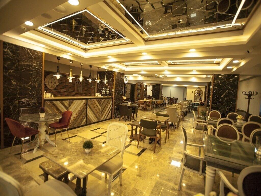 Restaurant Lion Park Suites & Residence Hotel