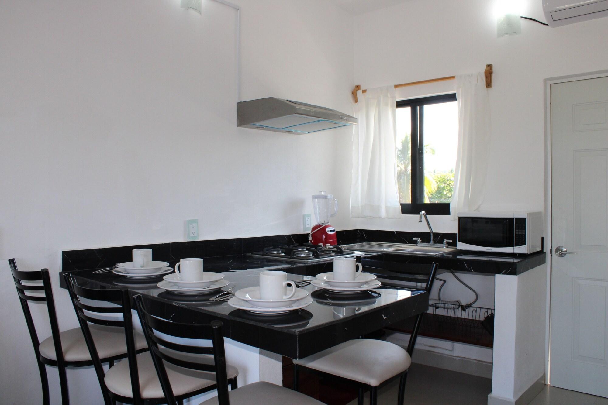 Equipamiento de Habitación Suites del Carmen