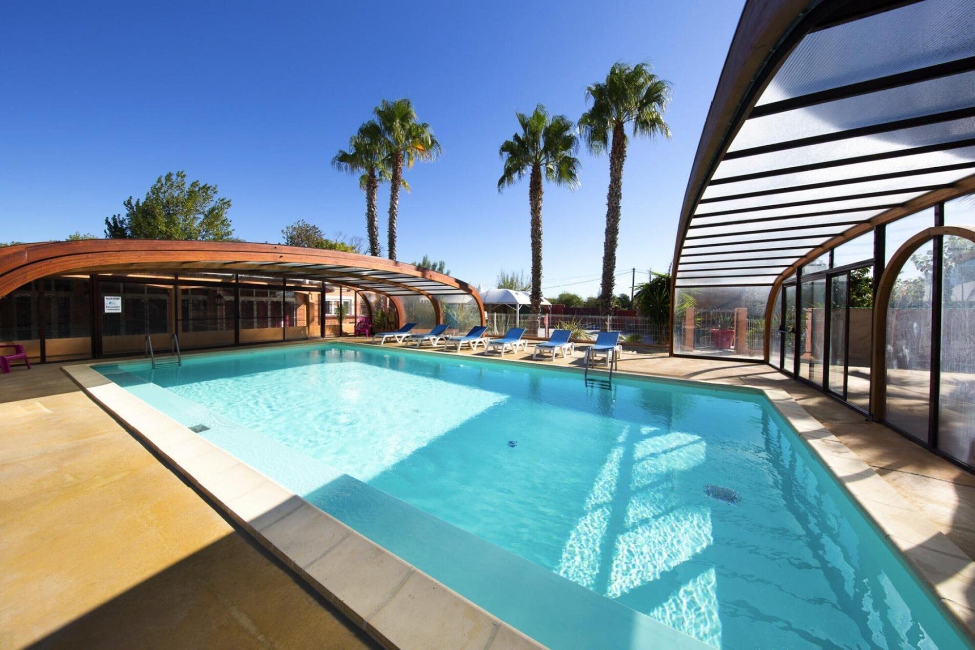 Vista Piscina Caravan Park Camping in Vias for 4