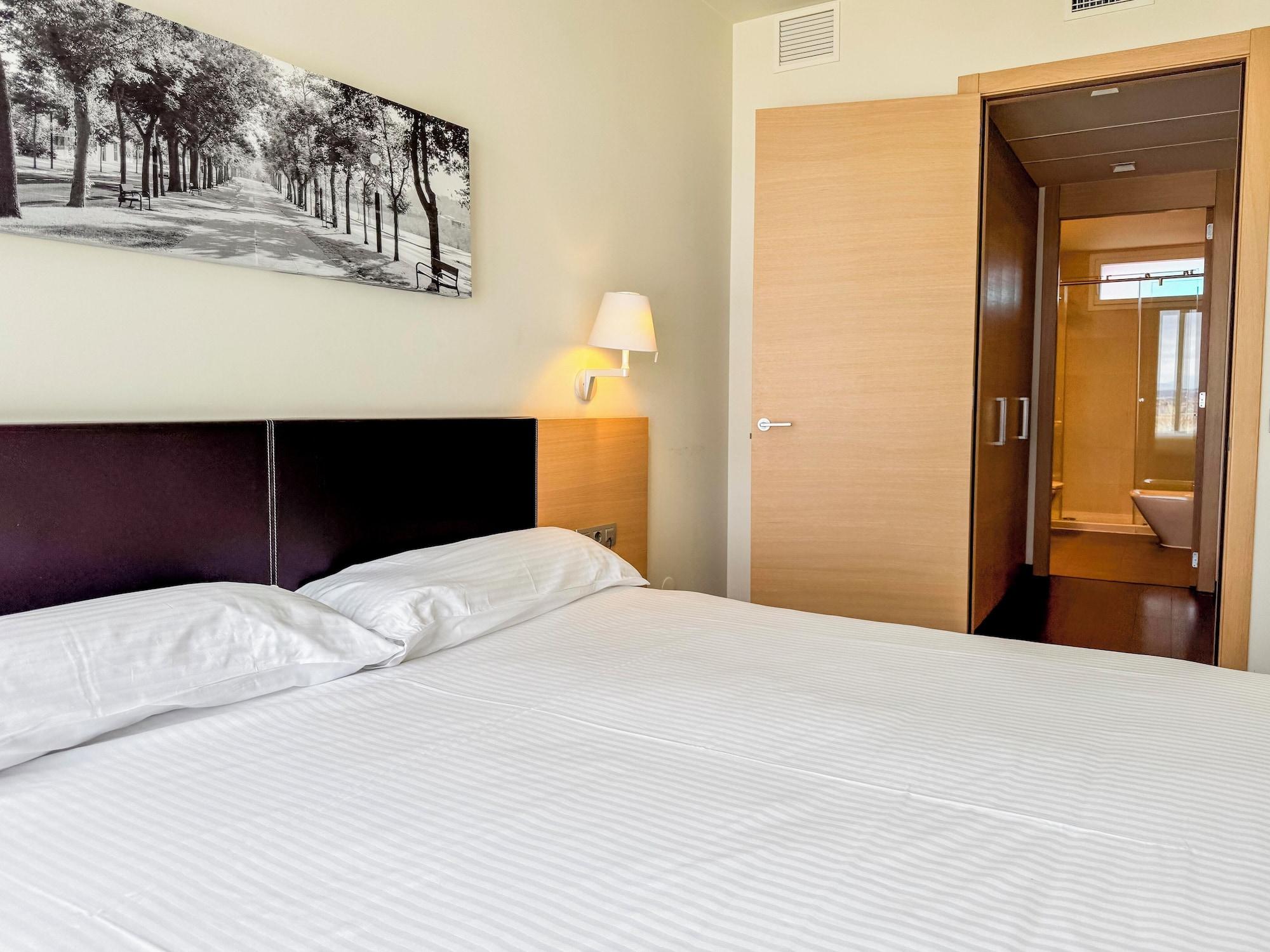 Habitación Jardines de Uleta Suites