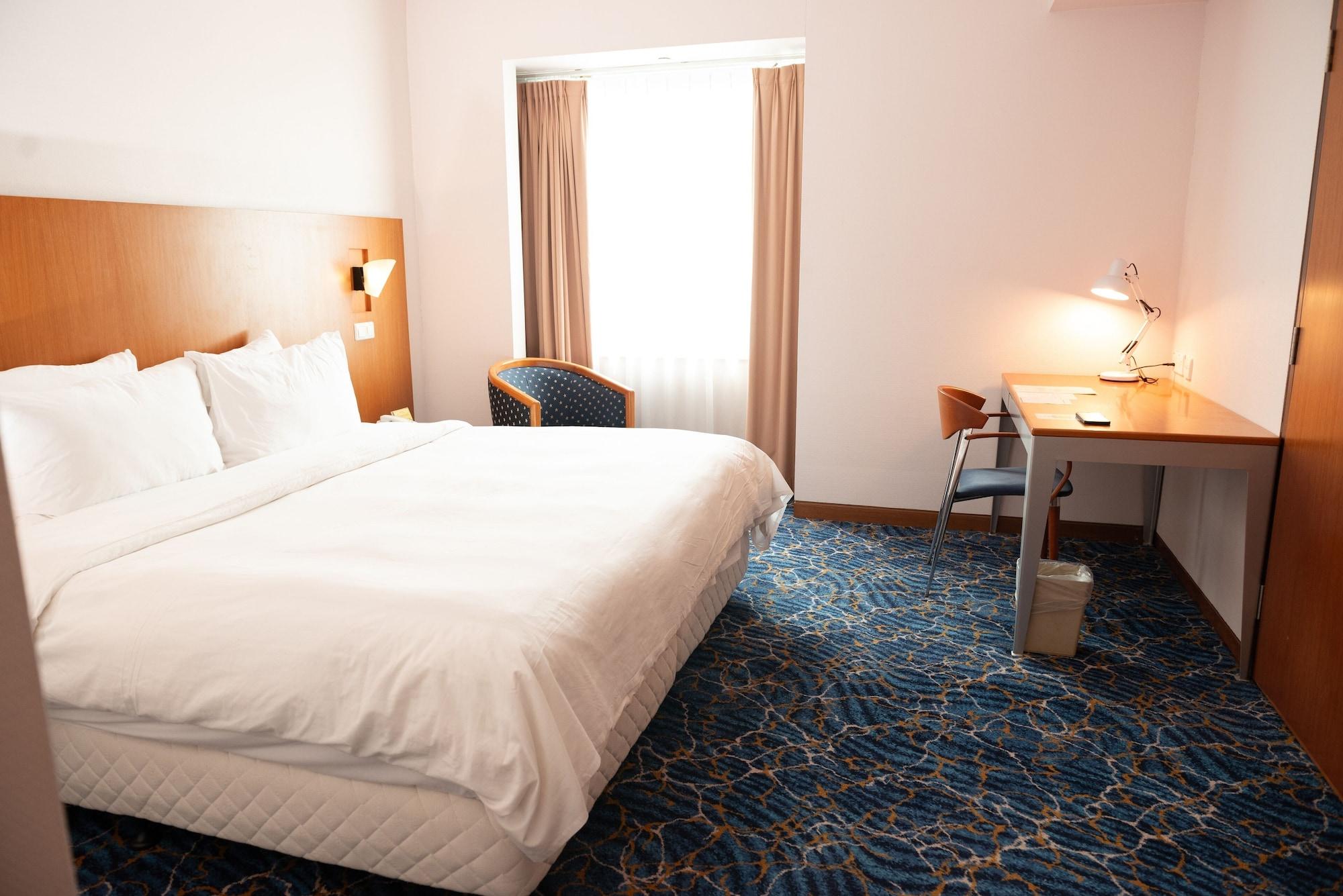 Habitación Parkcity Everly Hotel