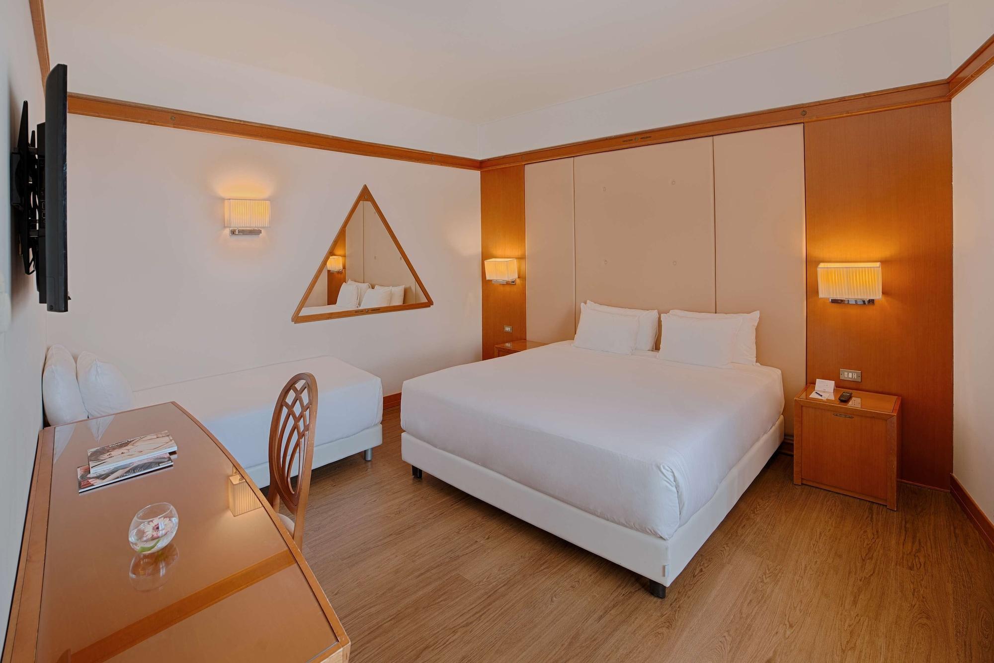 Habitación NH Pisa