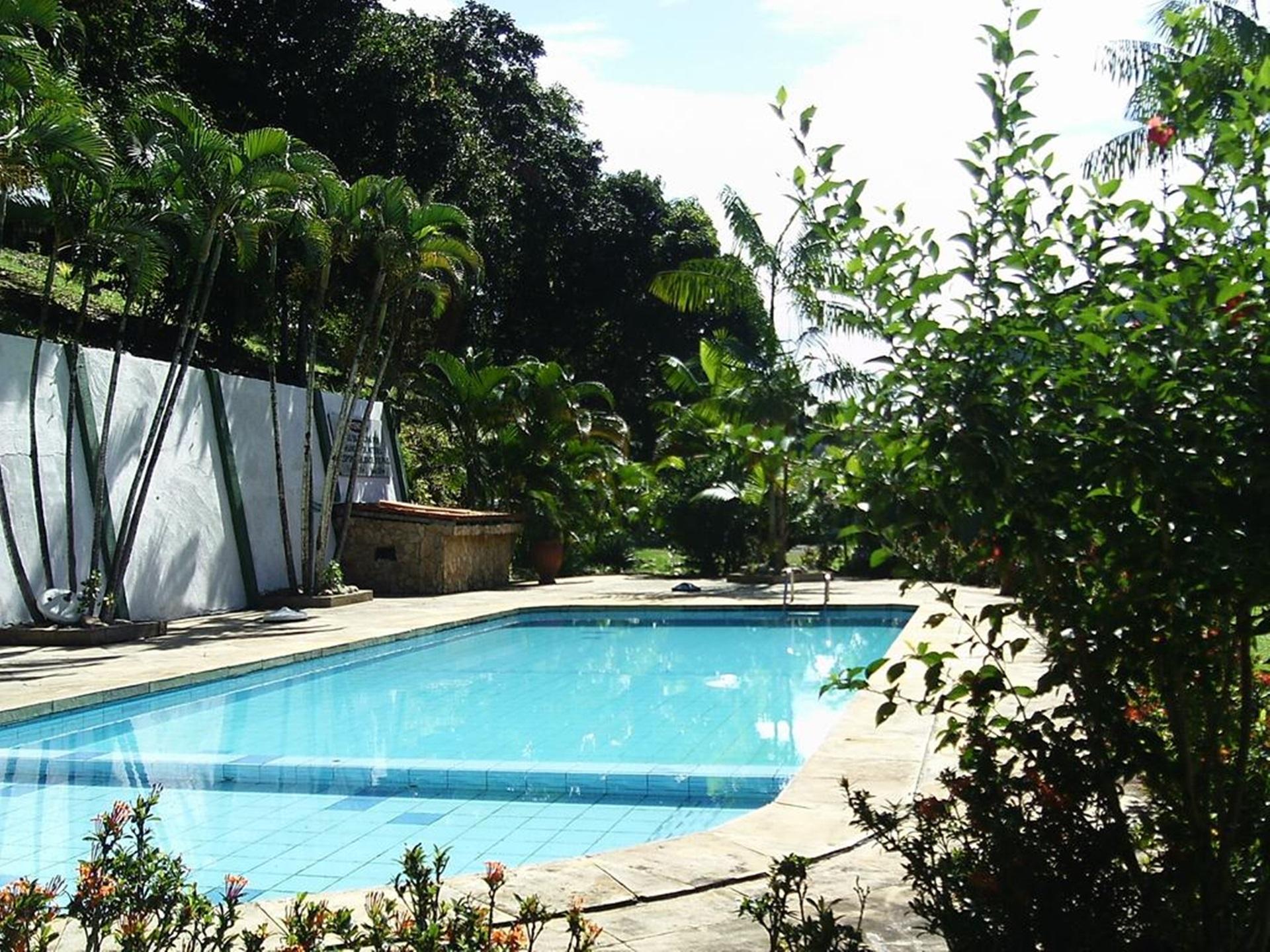 Vista da piscina VOA Hotel Manaká