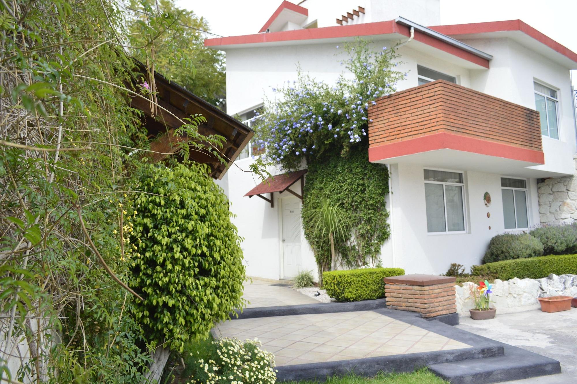 Vista Exterior Privada 400 Casas & Suites