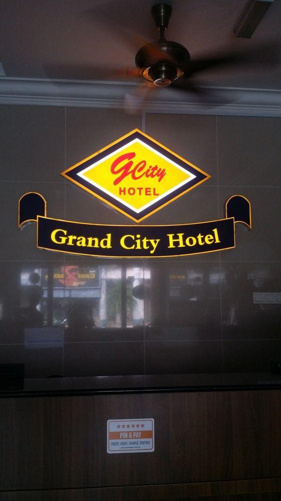 Varios Super OYO 546 Grand City Hotel