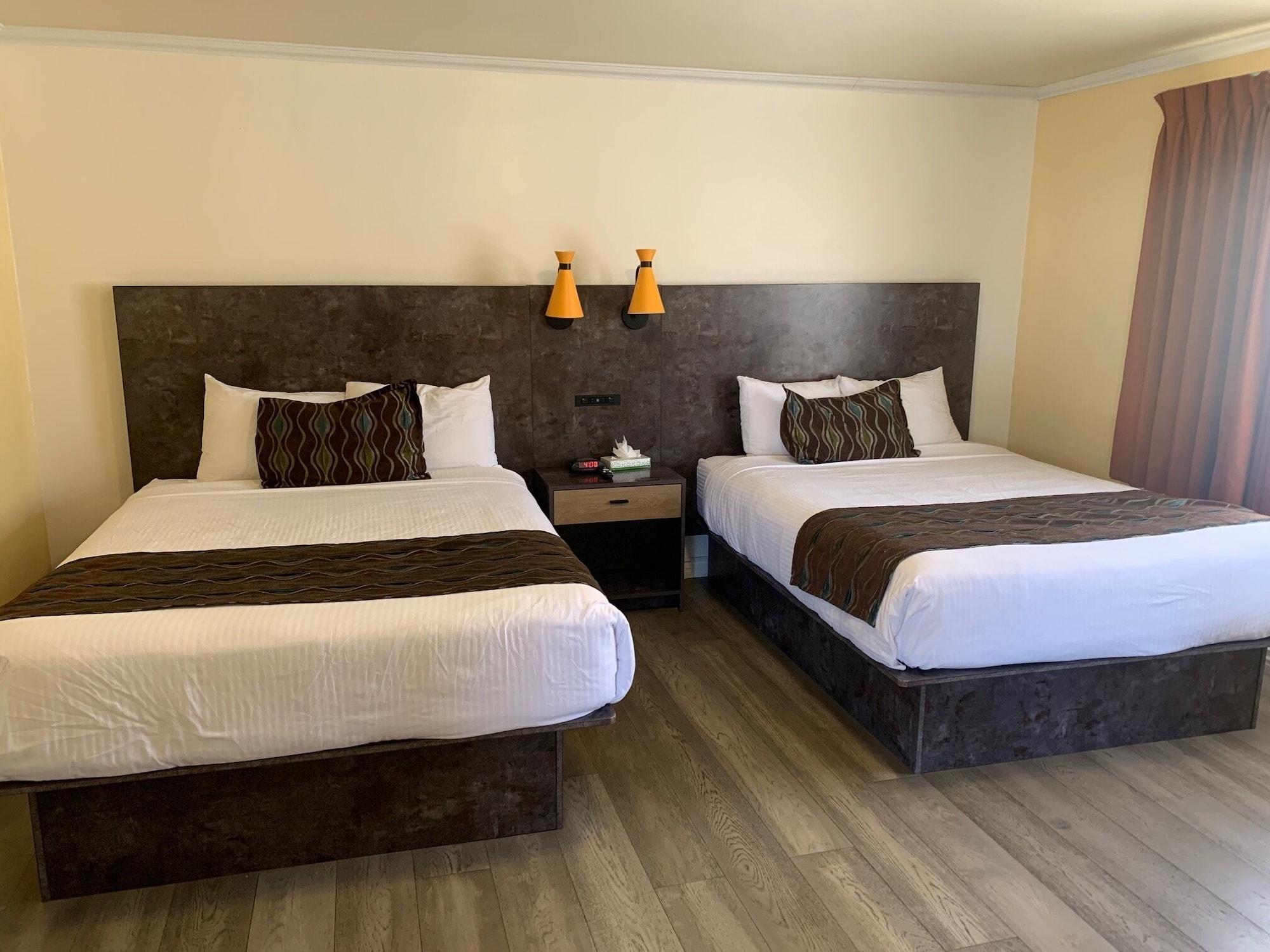 Habitación Oasis Inn & Suites