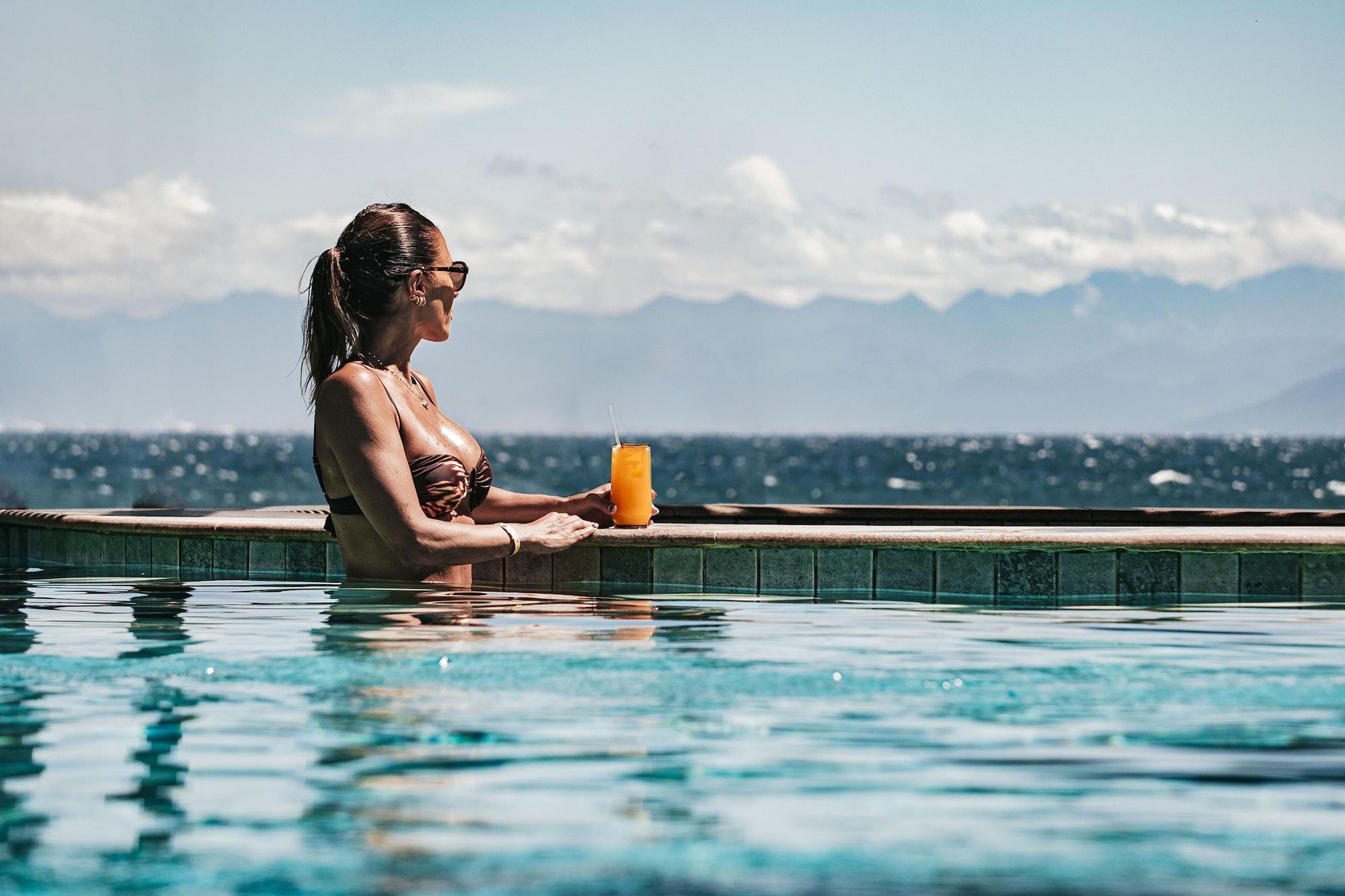 Vista Piscina Hotel Ville La Plage & Beach Club