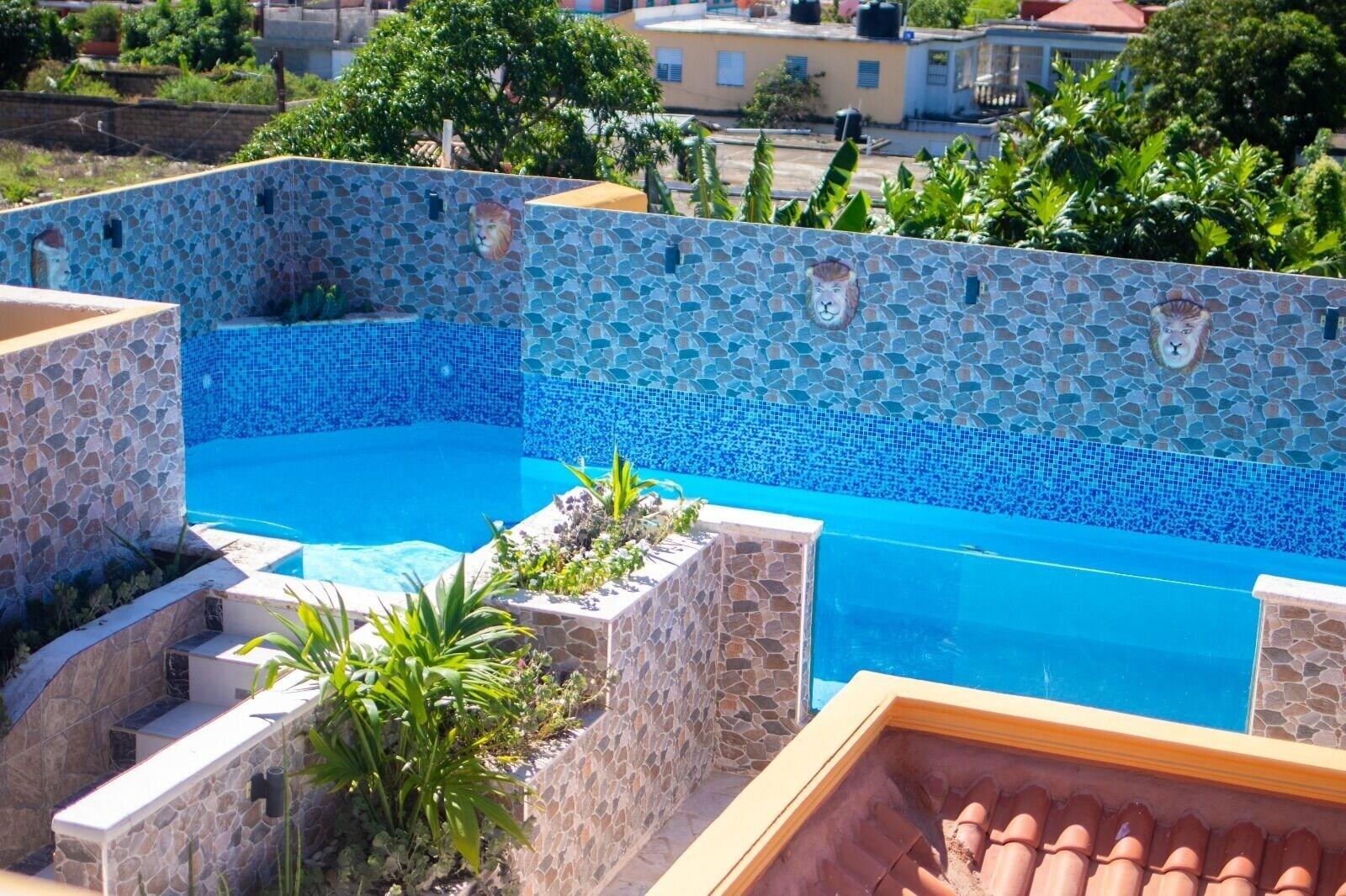 Vista Piscina Diosamar Hotel y Suite