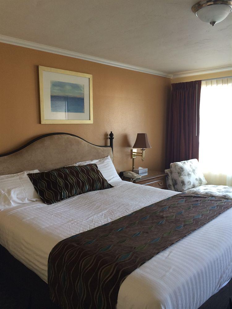 Habitación Oasis Inn & Suites
